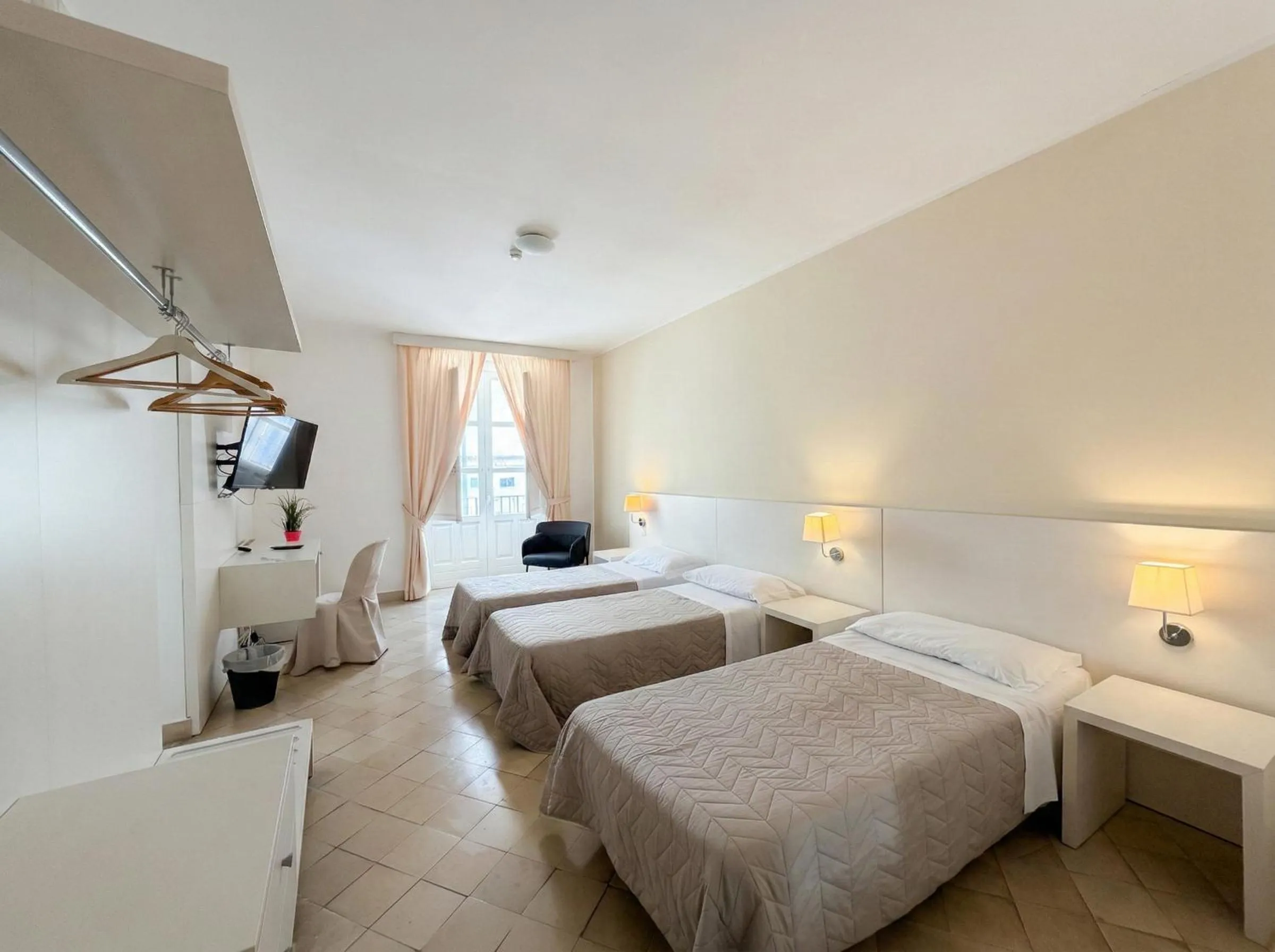 Bed in Ortigia Mastrarua rooms