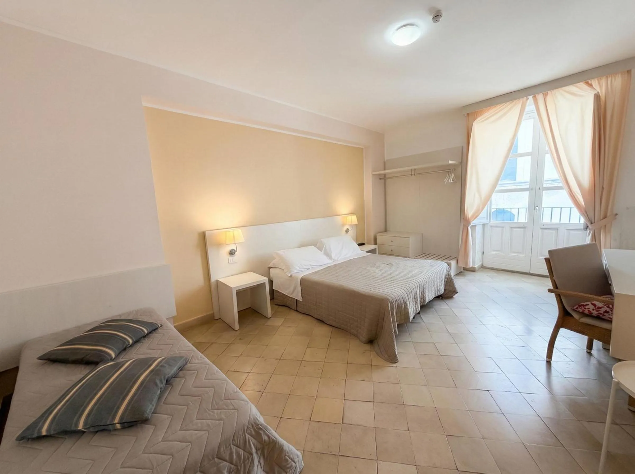 Bed in Ortigia Mastrarua rooms