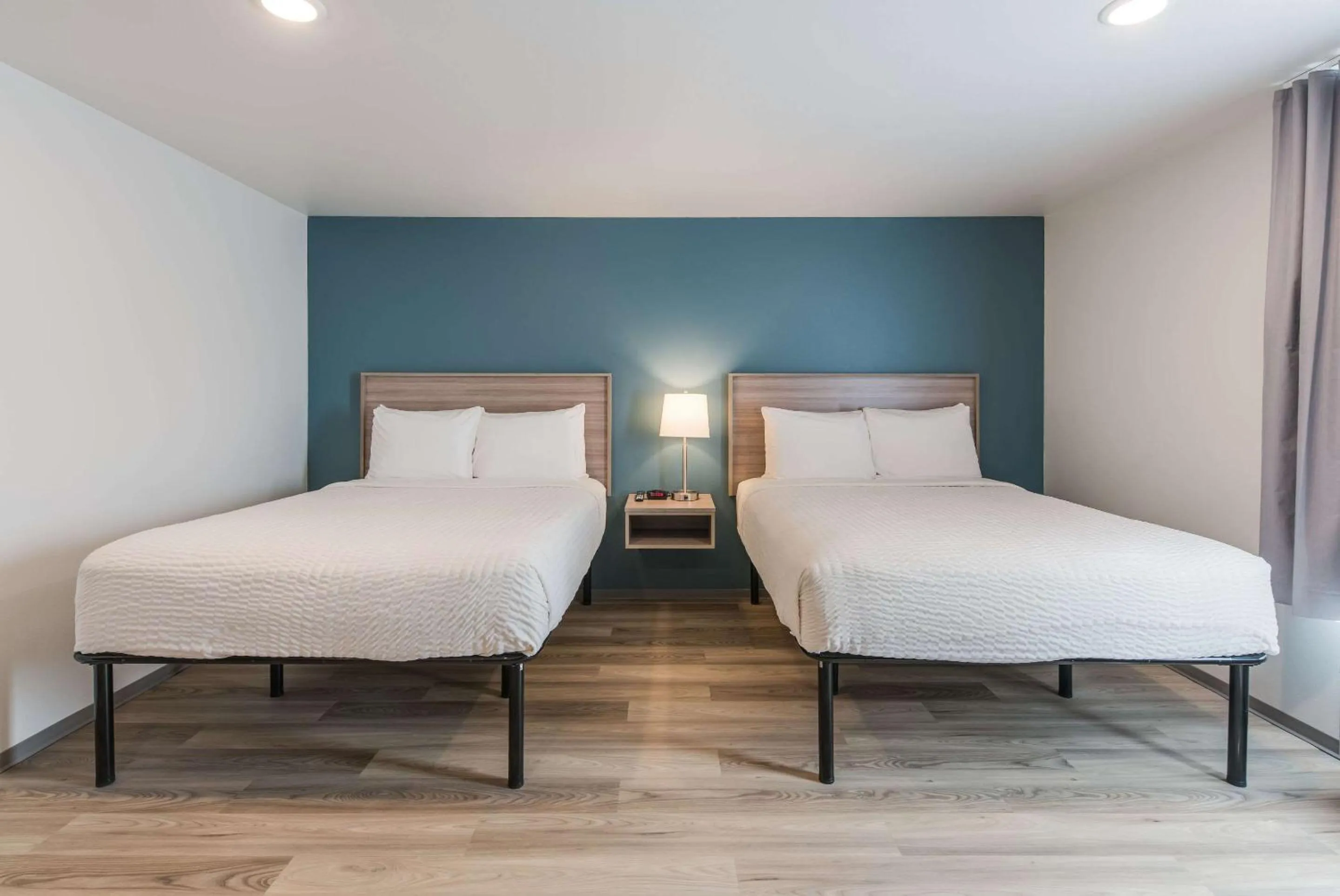 Photo of the whole room, Bed in WoodSpring Suites Tri-Cities Richland