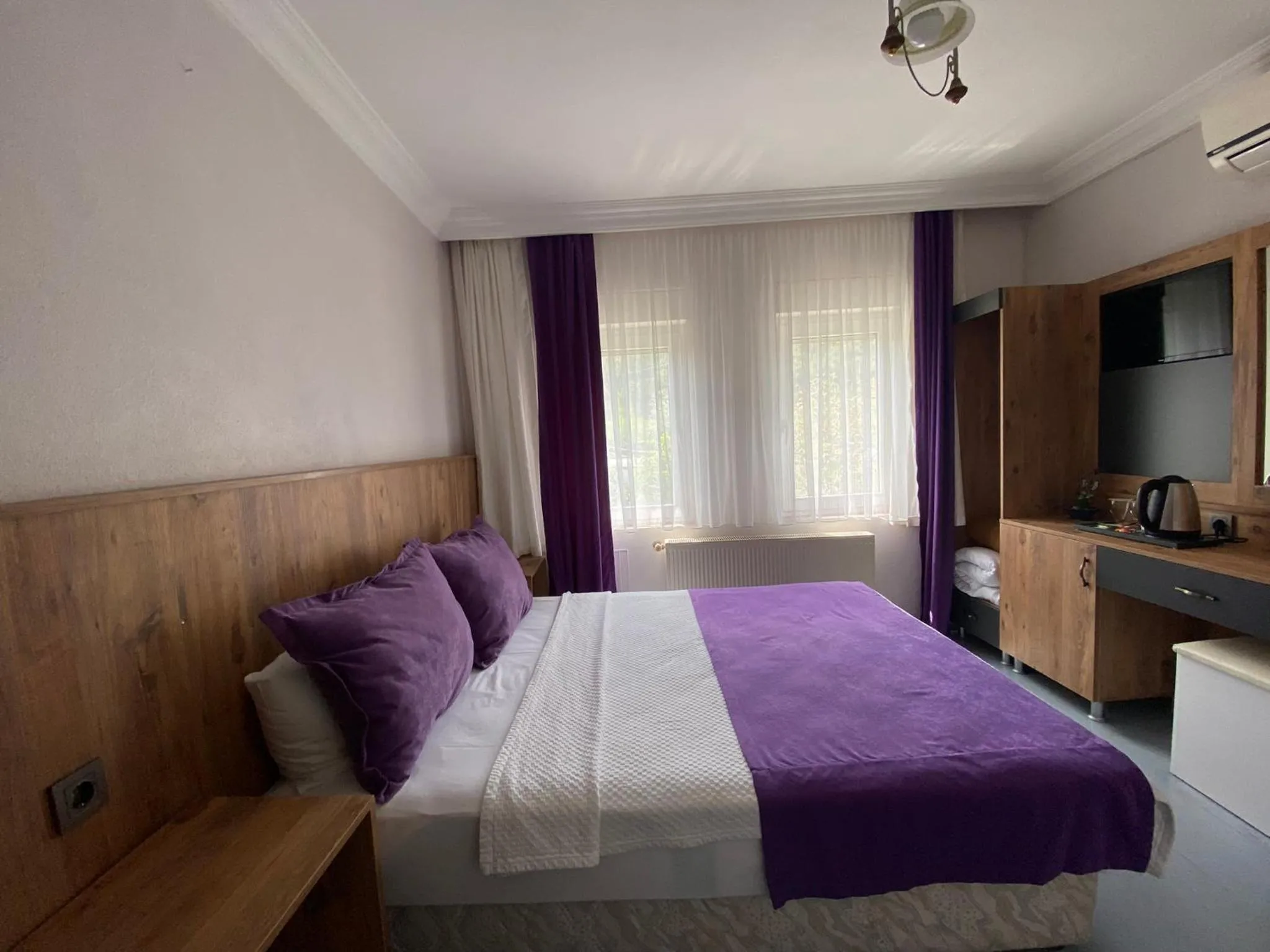 Bed in Cunda Aşiyan Otel
