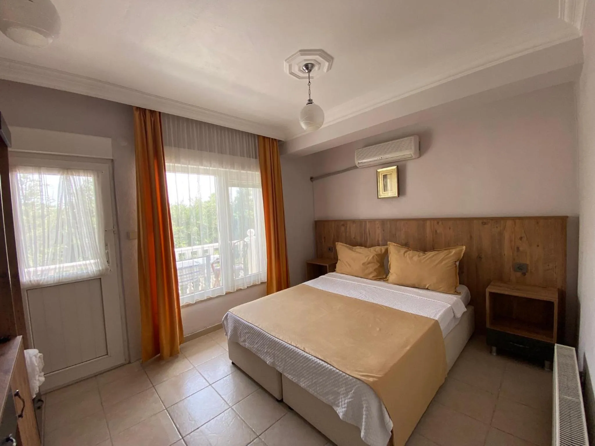 Bed in Cunda Aşiyan Otel