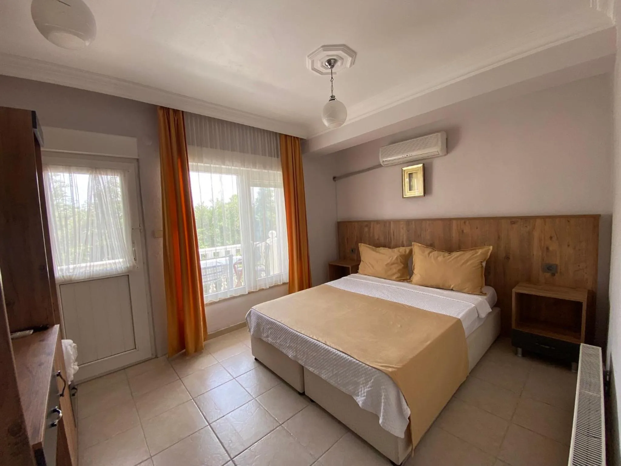 Bed in Cunda Aşiyan Otel
