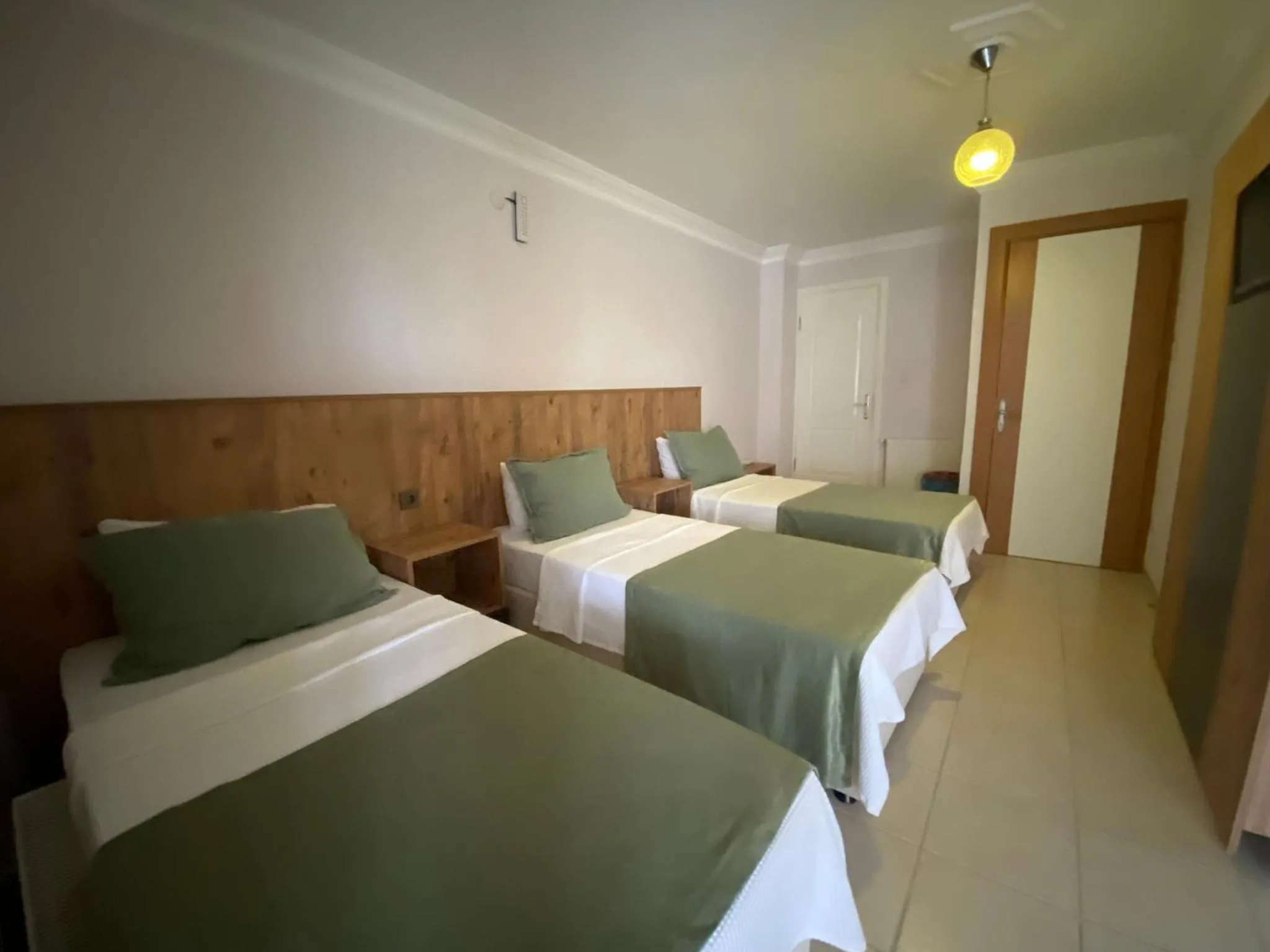Bed in Cunda Aşiyan Otel