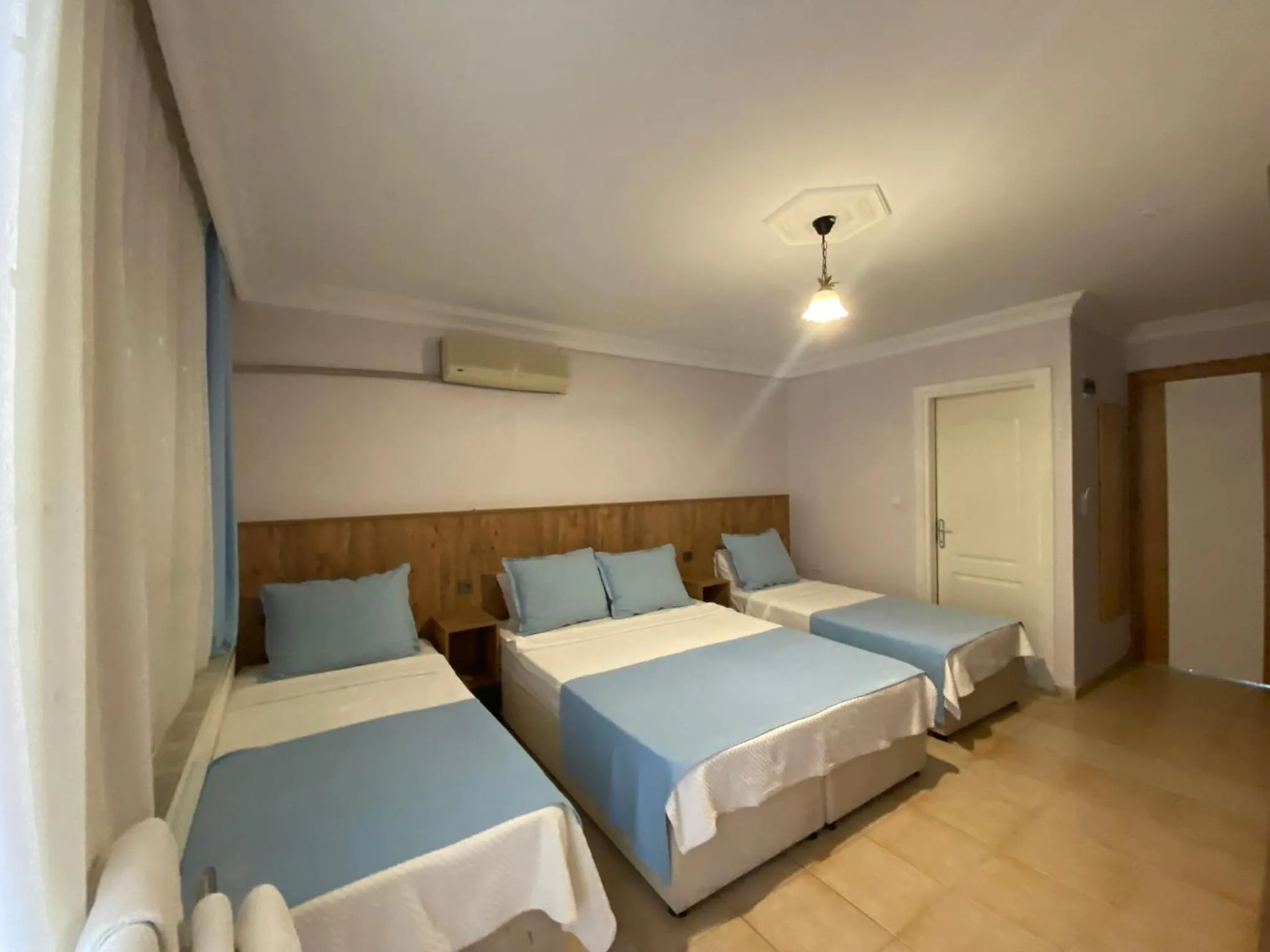 Bed in Cunda Aşiyan Otel