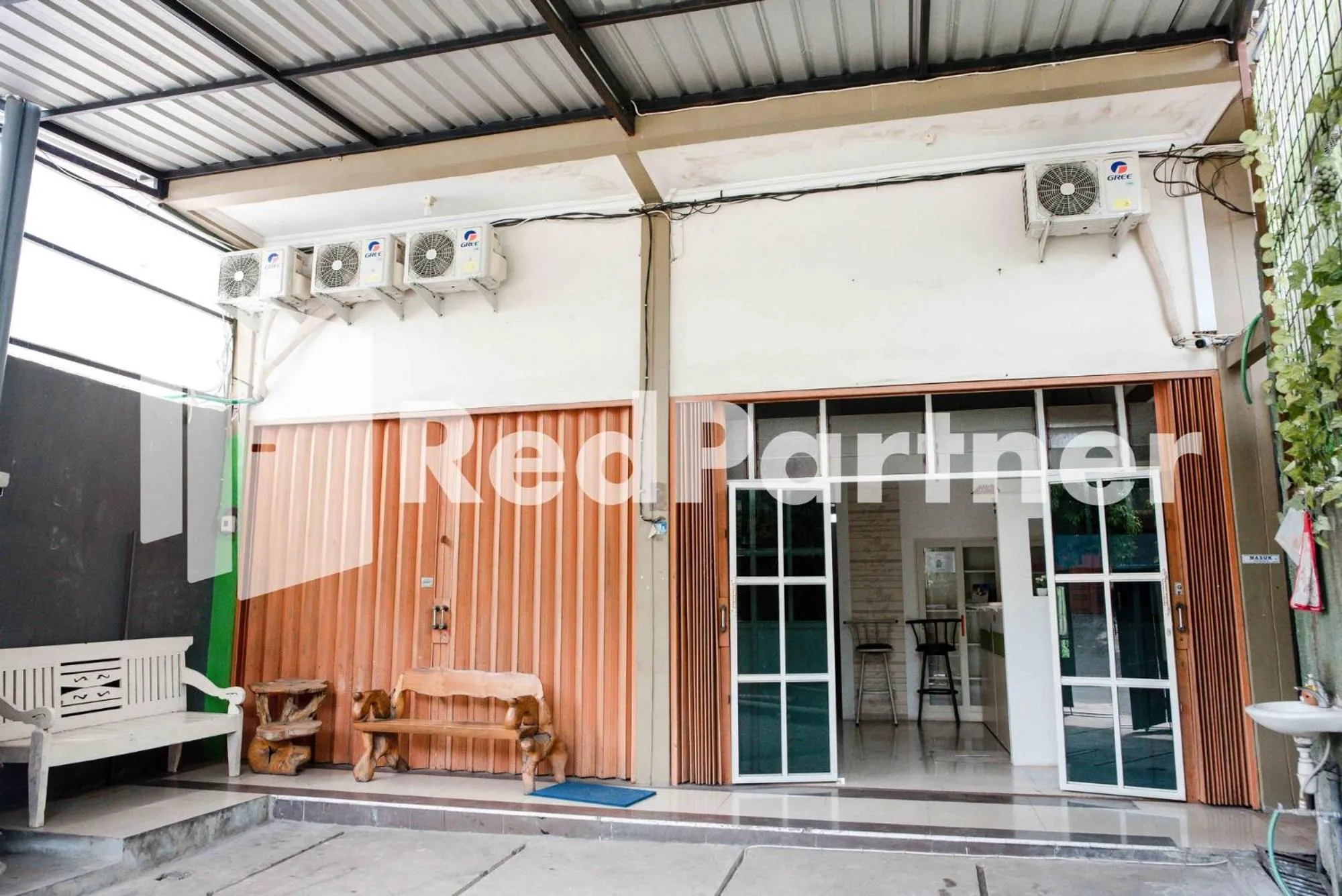 Property building in Happy Inn Puspo Mitra RedDoorz