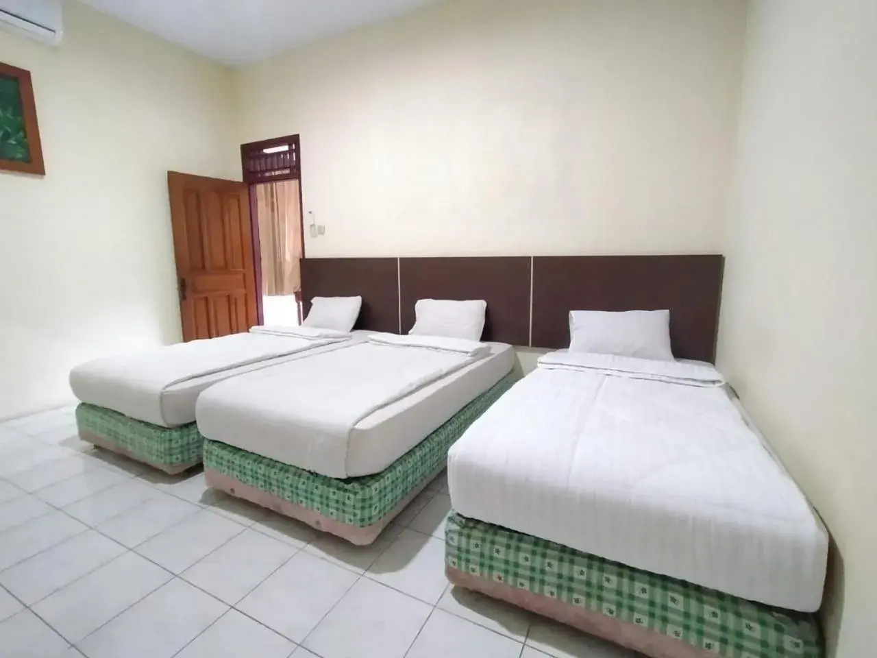 Bed in Grand Mutiara Hotel Puncak Bed in Grand Mutiara Hotel Puncak