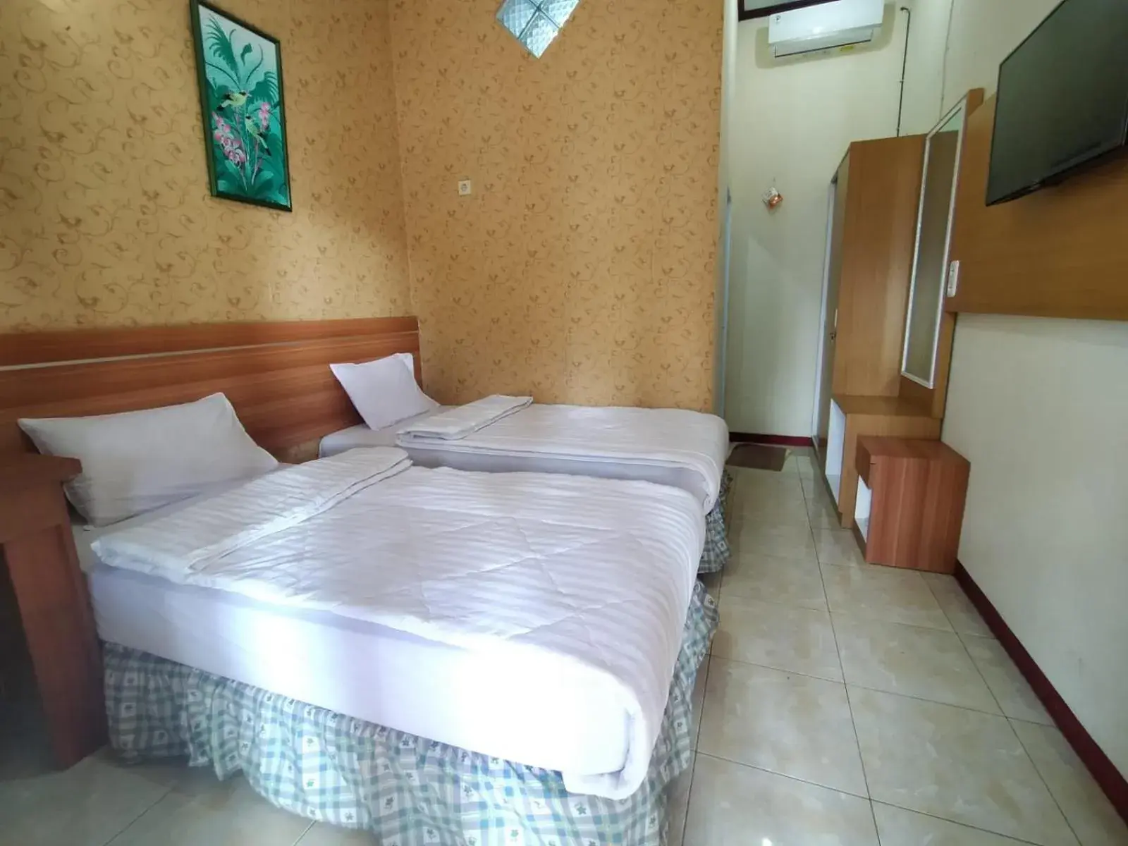 Bed in Grand Mutiara Hotel Puncak Bed in Grand Mutiara Hotel Puncak