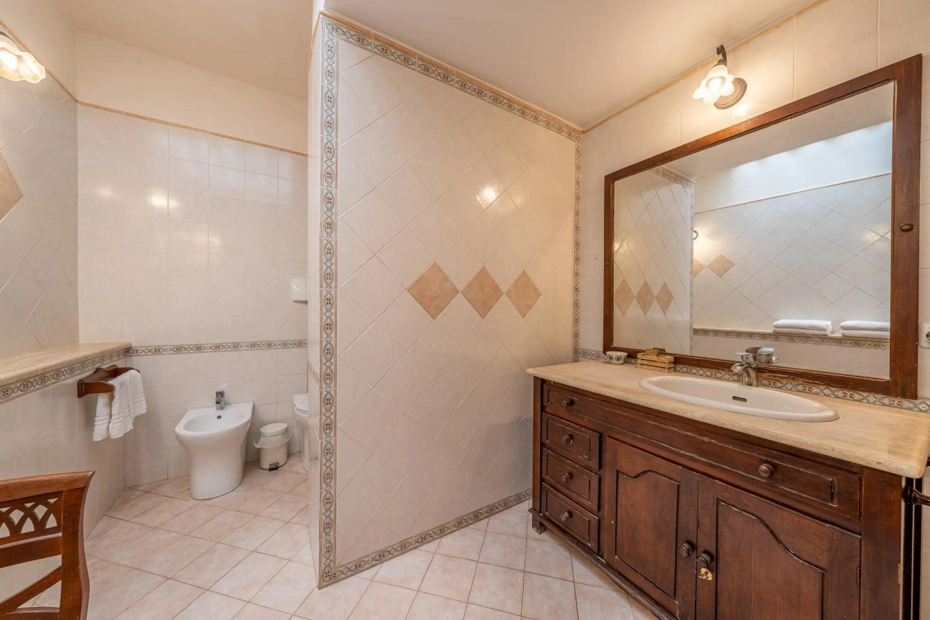 Bathroom in Villa Carlotta Resort