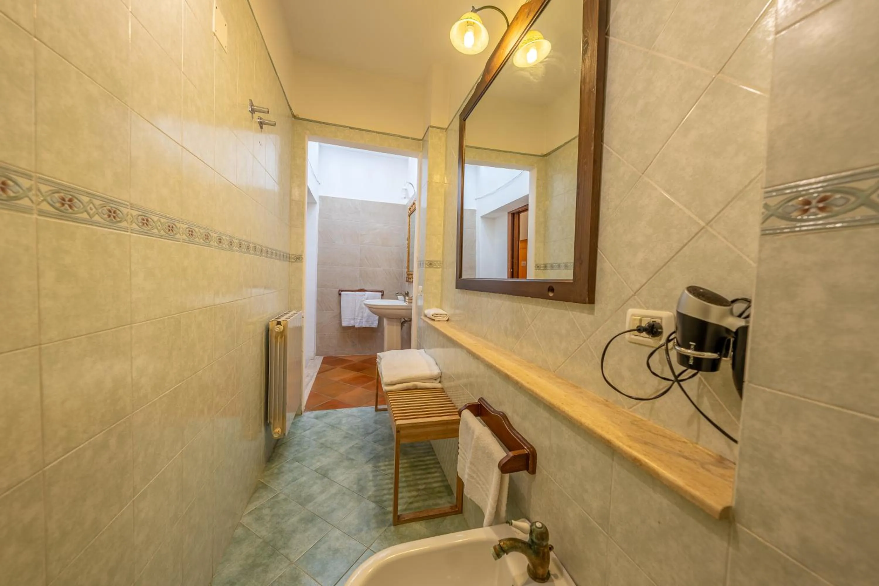 Bathroom in Villa Carlotta Resort