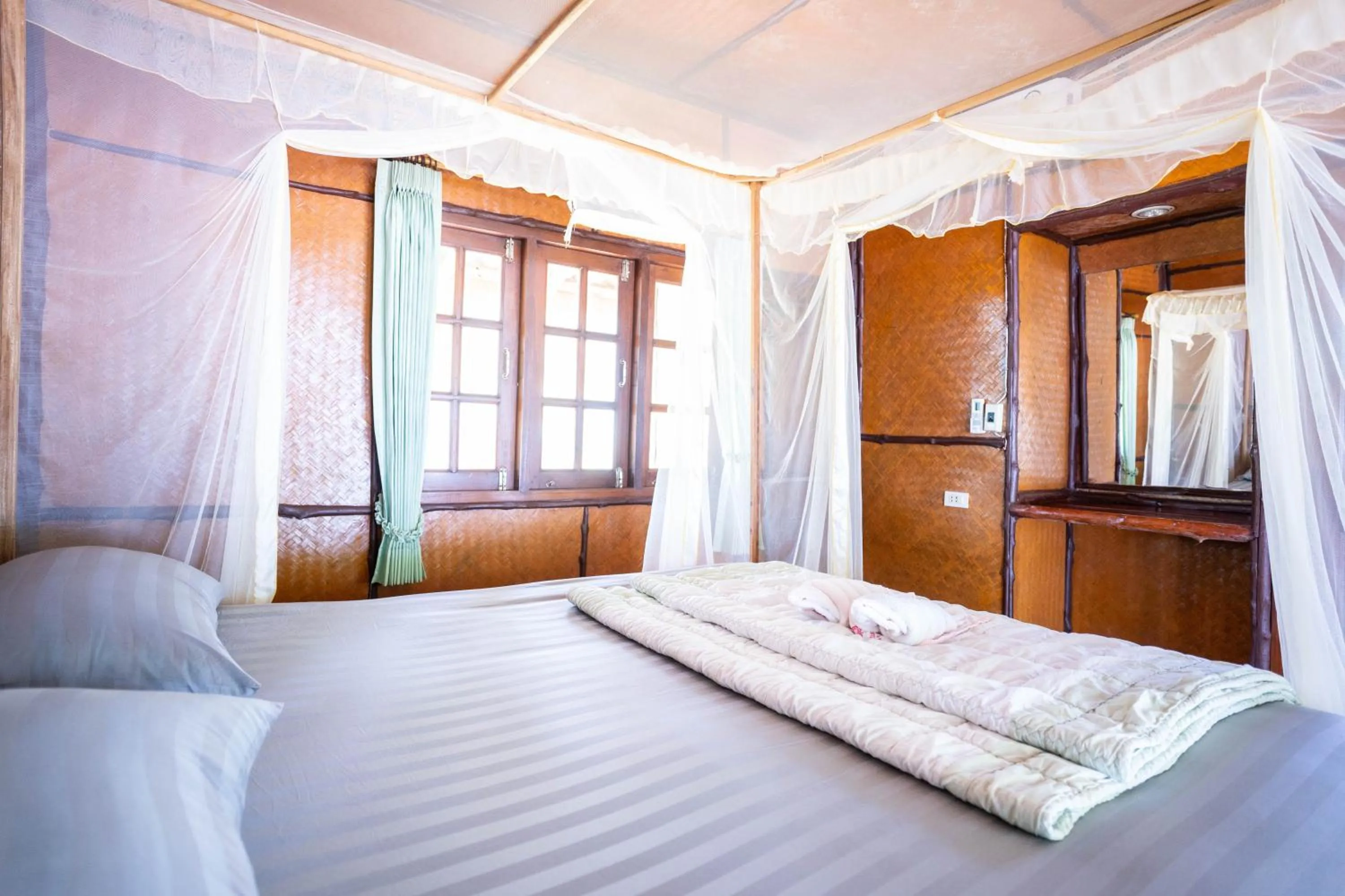Bed in Libong Beach Resort