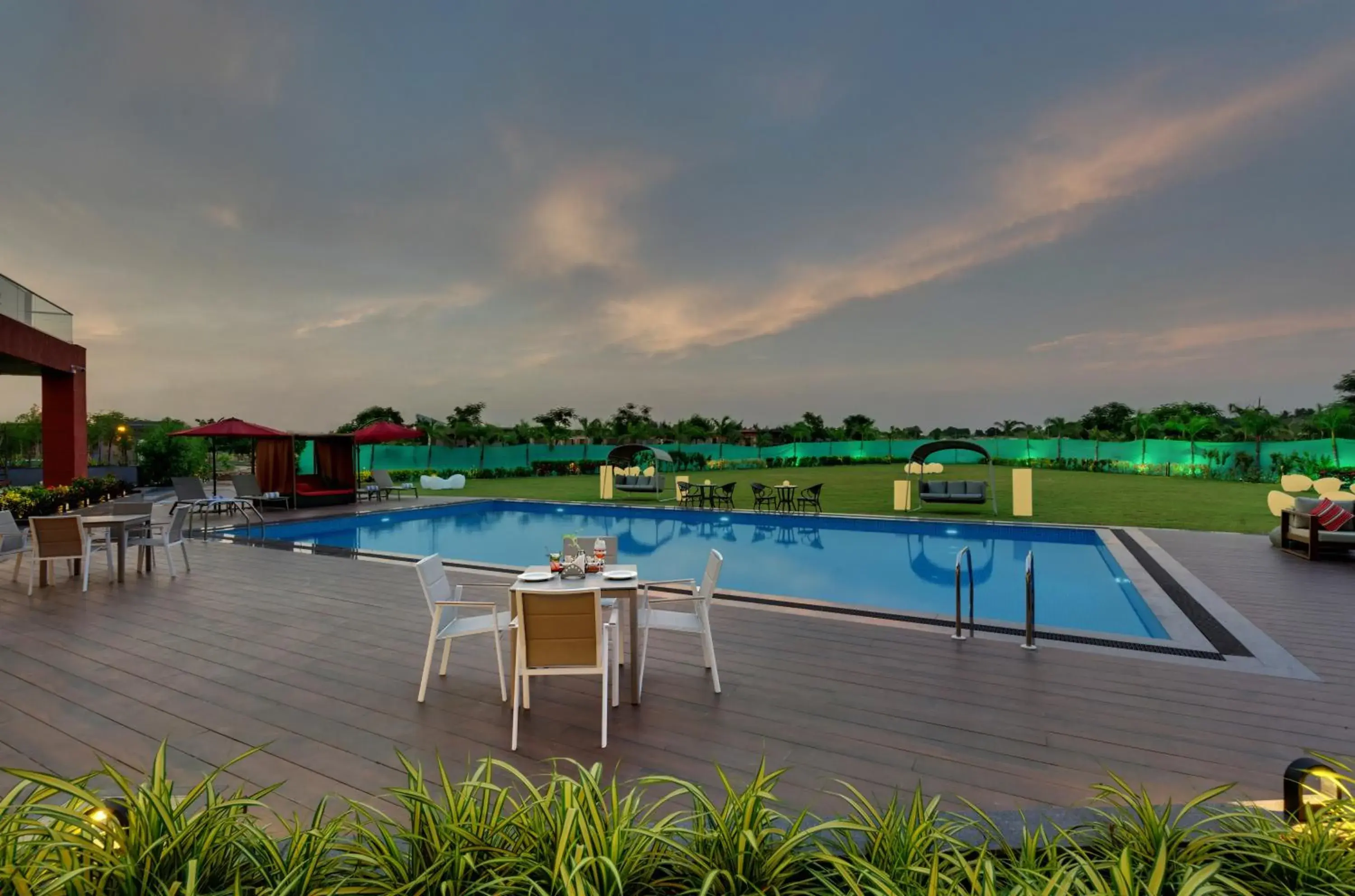 Swimming pool in The Fern Royal Farm Resort, Anjar Swimming pool in The Fern Royal Farm Resort, Anjar