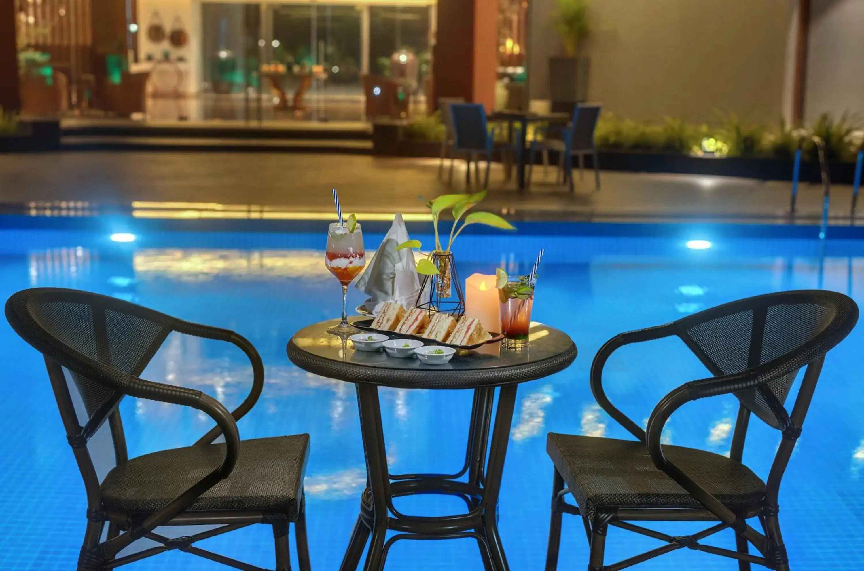 Swimming pool in The Fern Royal Farm Resort, Anjar Swimming pool in The Fern Royal Farm Resort, Anjar