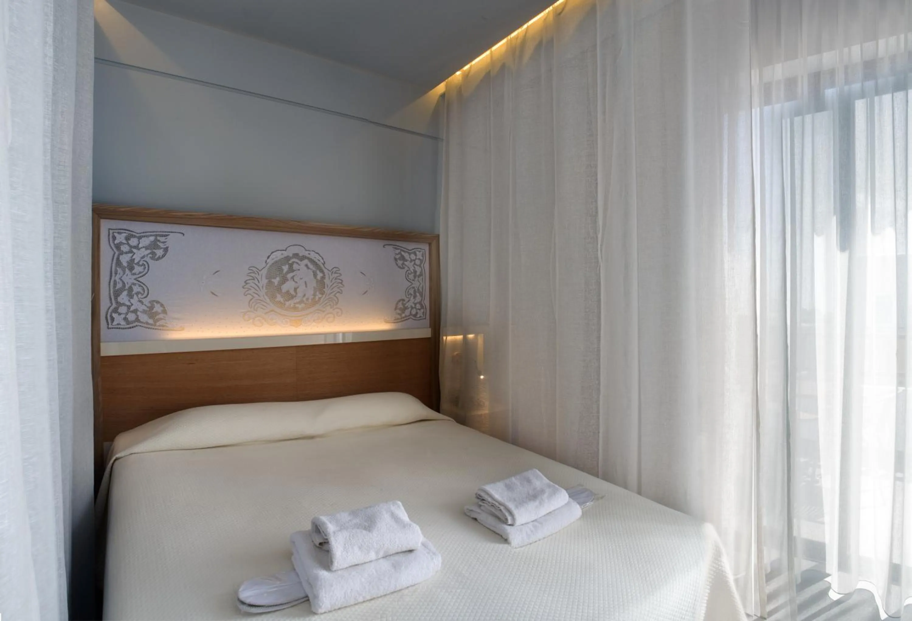 Bed in Geraniotis Hotel and Resort