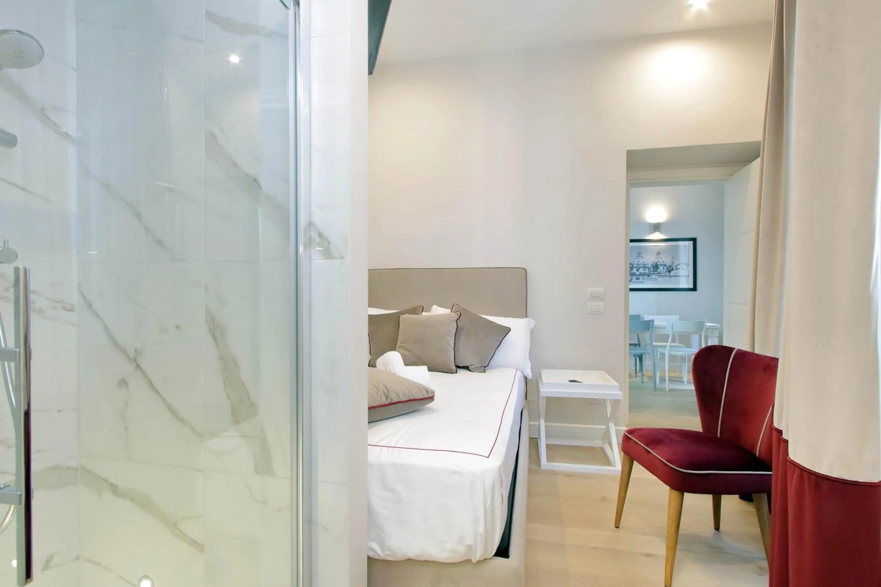 Photo of the whole room, Bed in Monti Panisperna suites