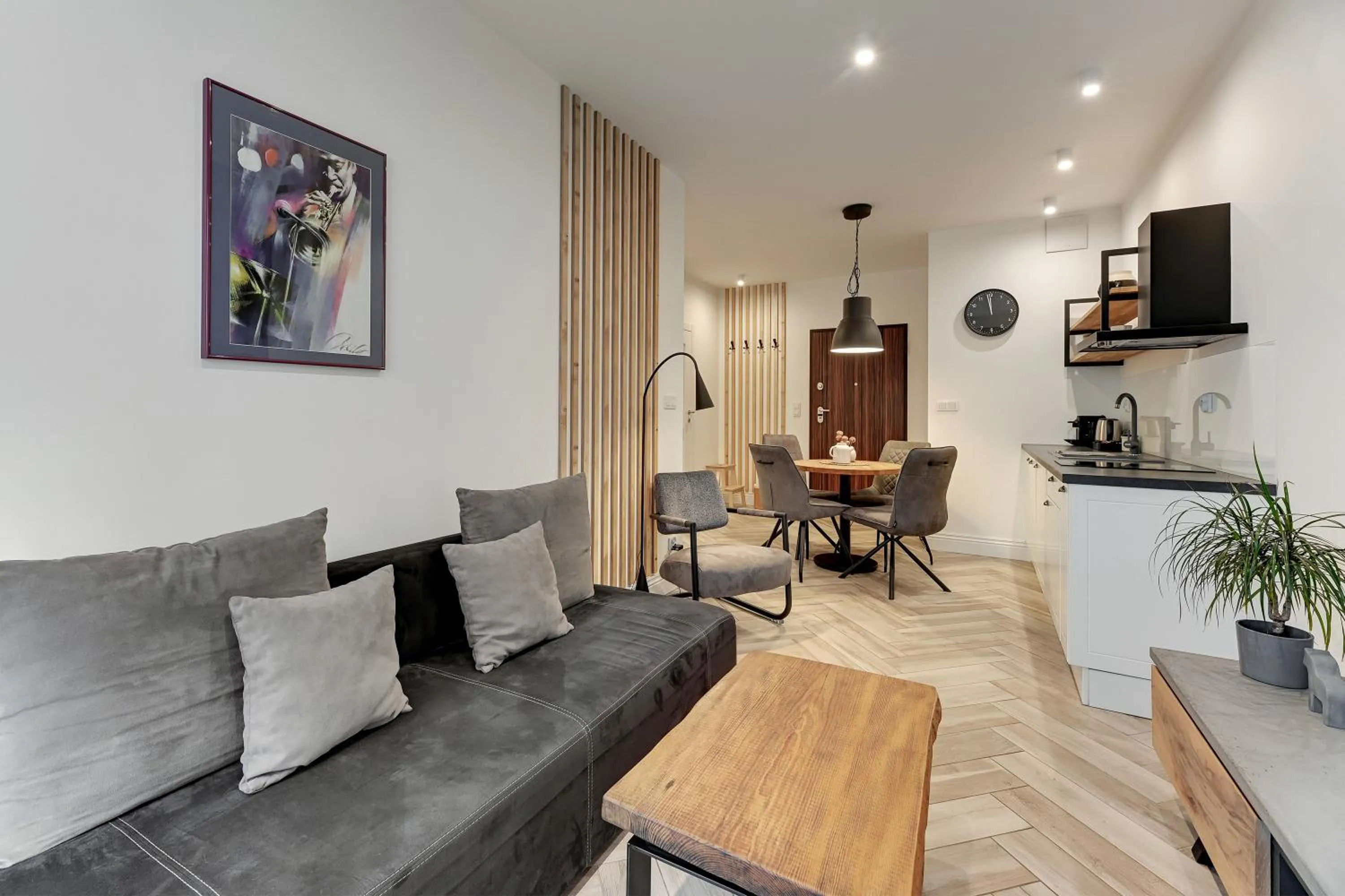 TV and multimedia in Aura III Apartments & Free Parking by Downtown Apartments