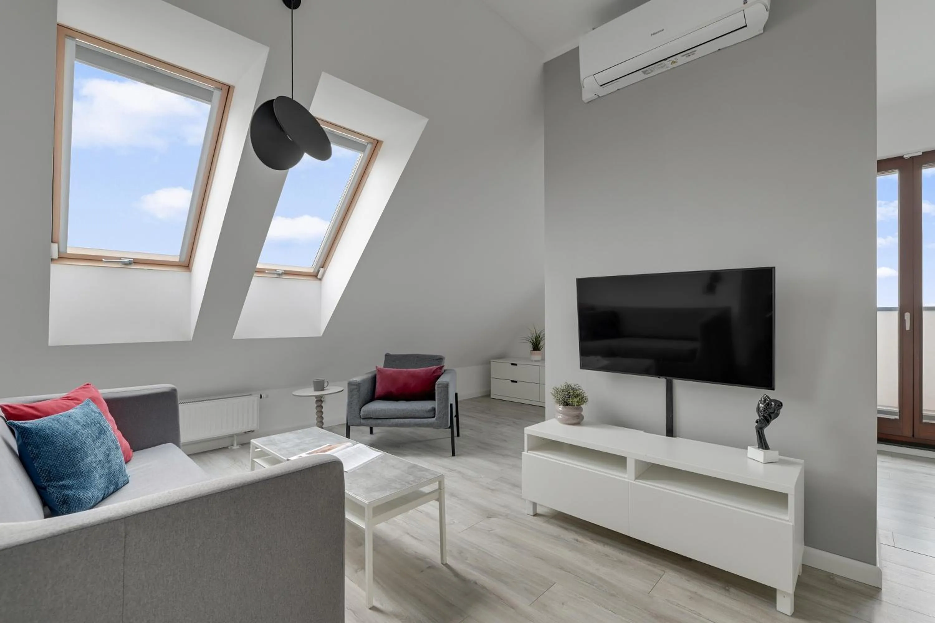 TV and multimedia in Aura III Apartments & Free Parking by Downtown Apartments