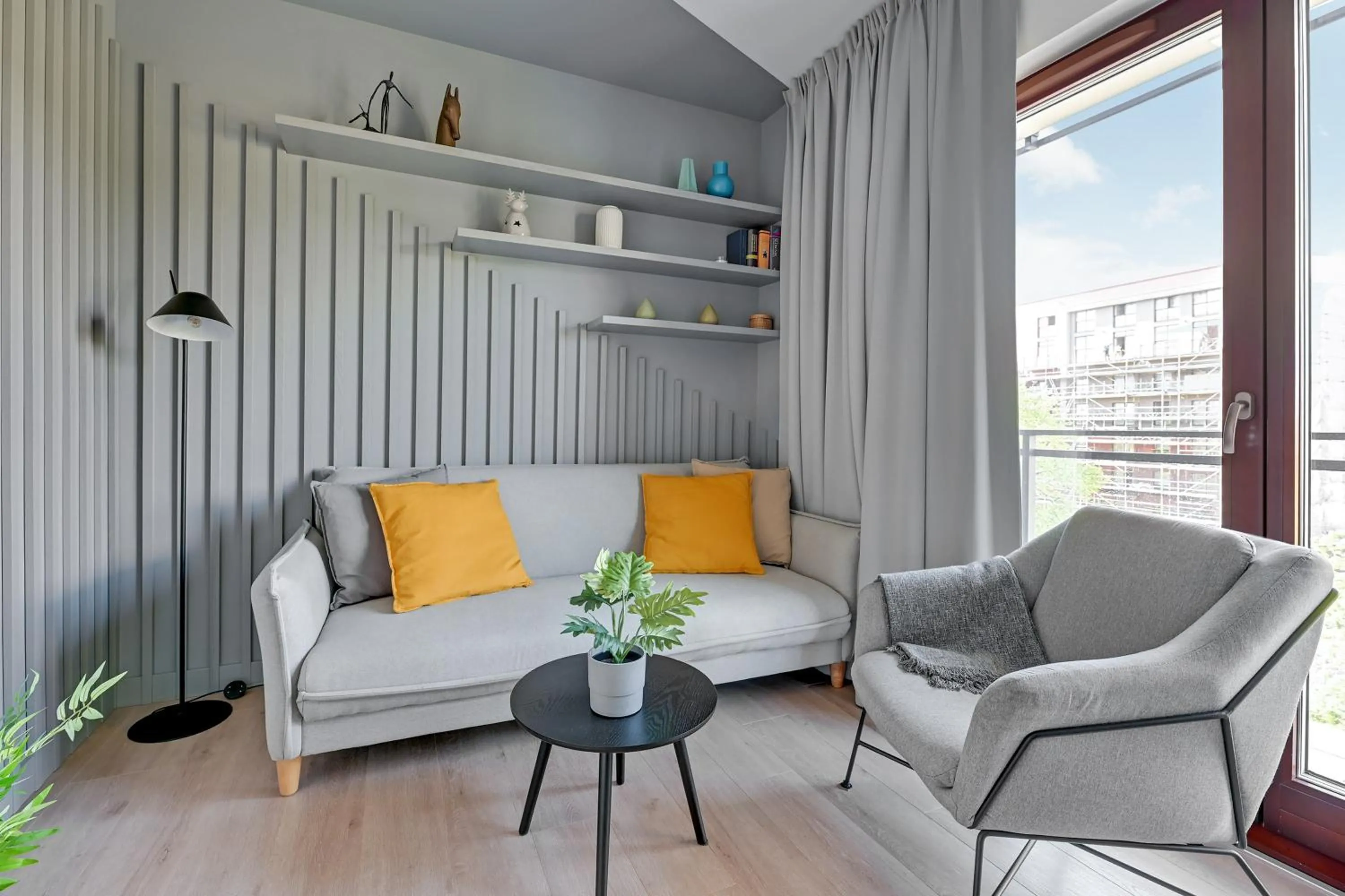 Living room in Aura III Apartments & Free Parking by Downtown Apartments