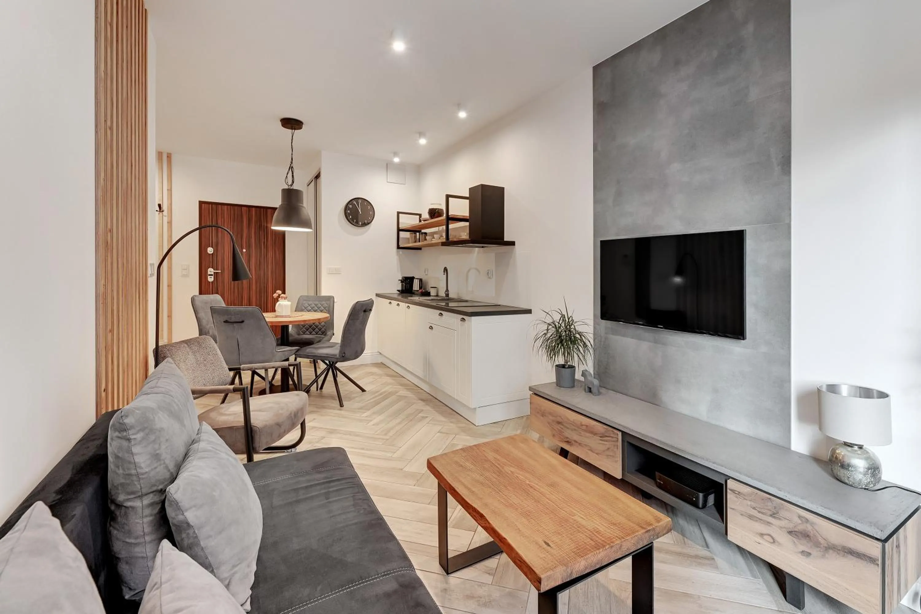 TV and multimedia in Aura III Apartments & Free Parking by Downtown Apartments