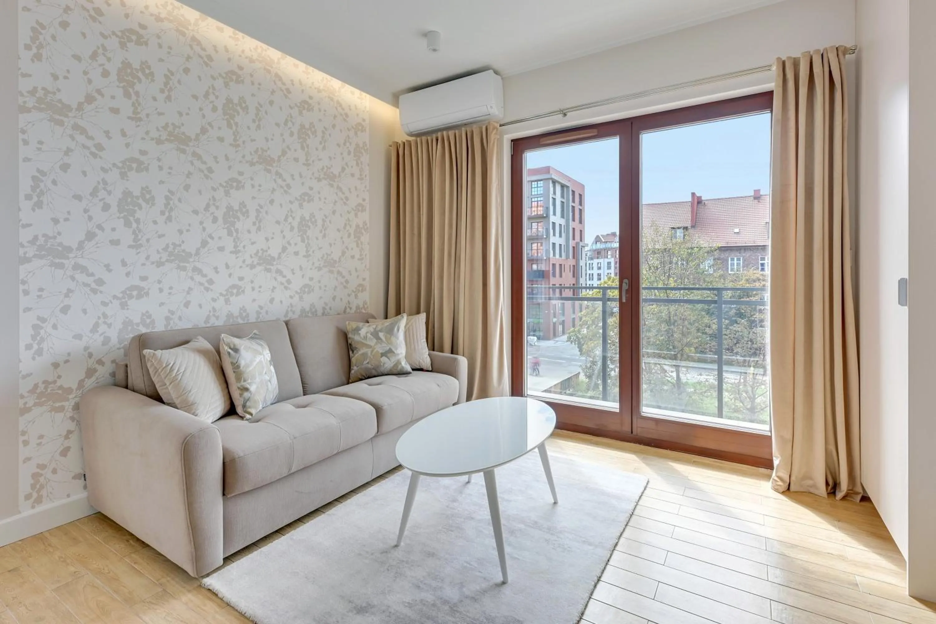 Living room in Aura III Apartments & Free Parking by Downtown Apartments