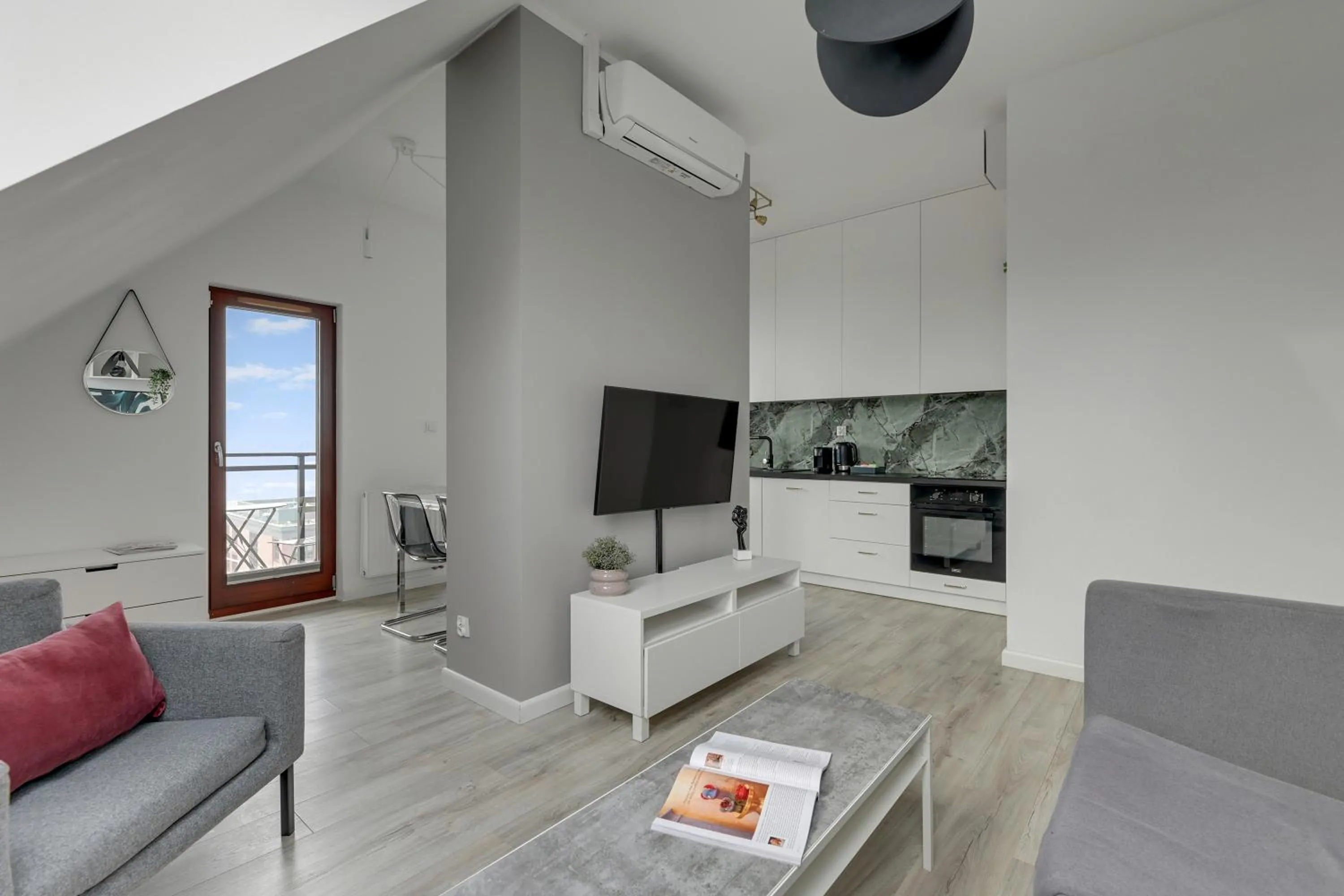 TV and multimedia in Aura III Apartments & Free Parking by Downtown Apartments