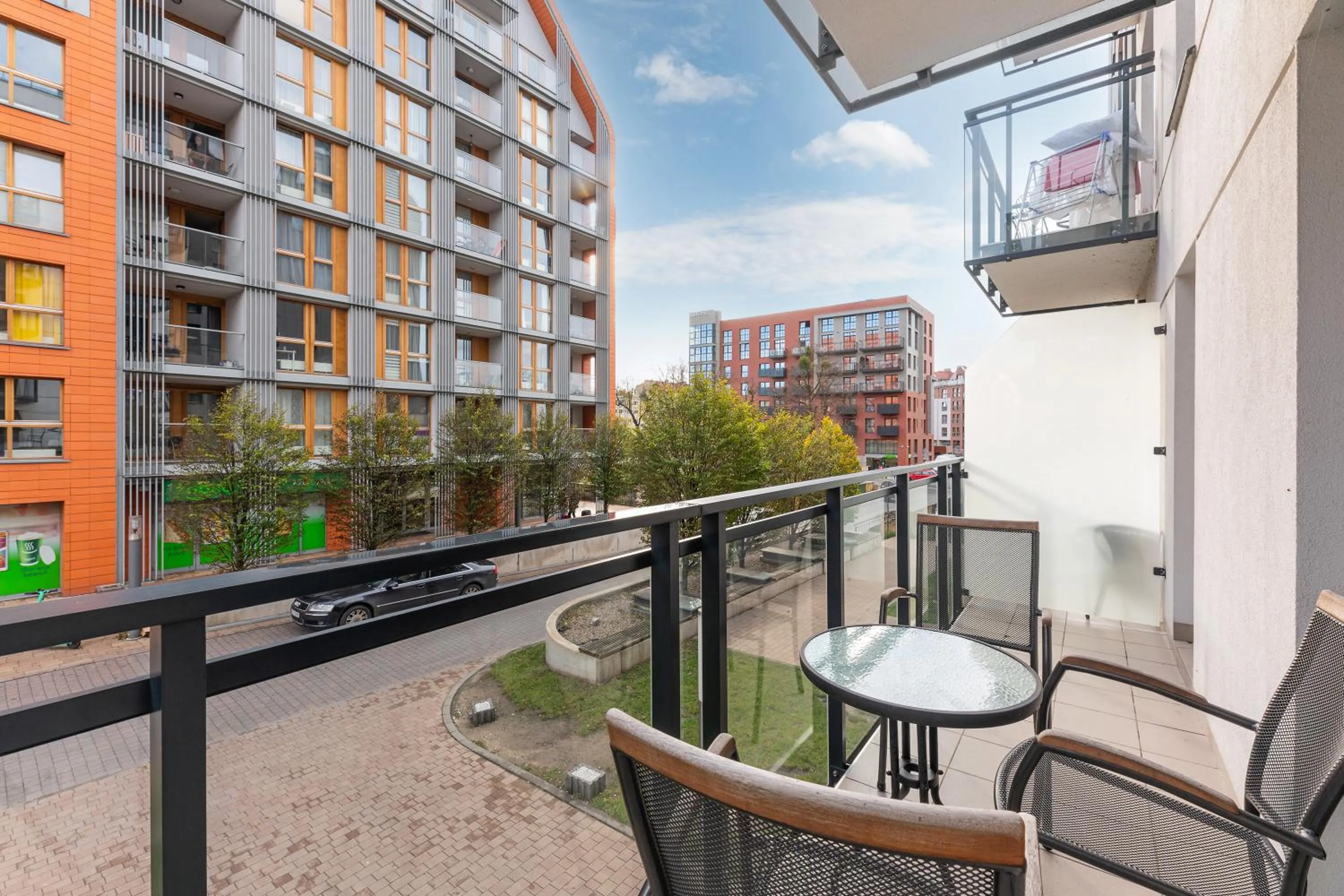 Property building in Aura III Apartments & Free Parking by Downtown Apartments