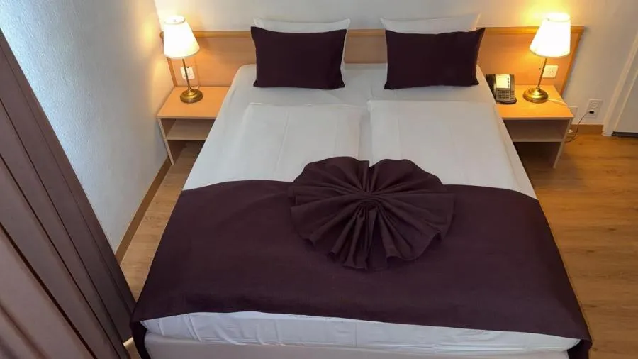 Photo of the whole room, Bed in Olympia Hotel Zurich