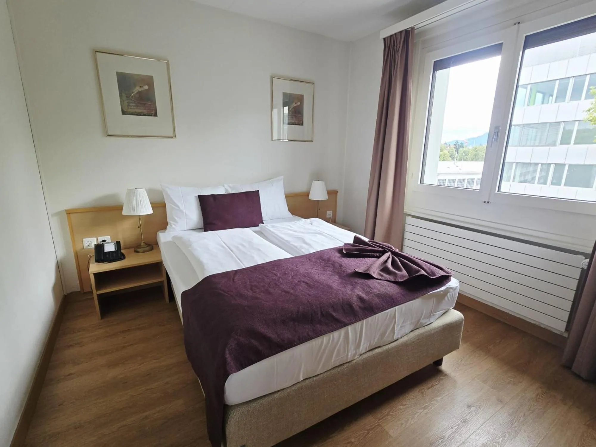 Bed in Olympia Hotel Zurich