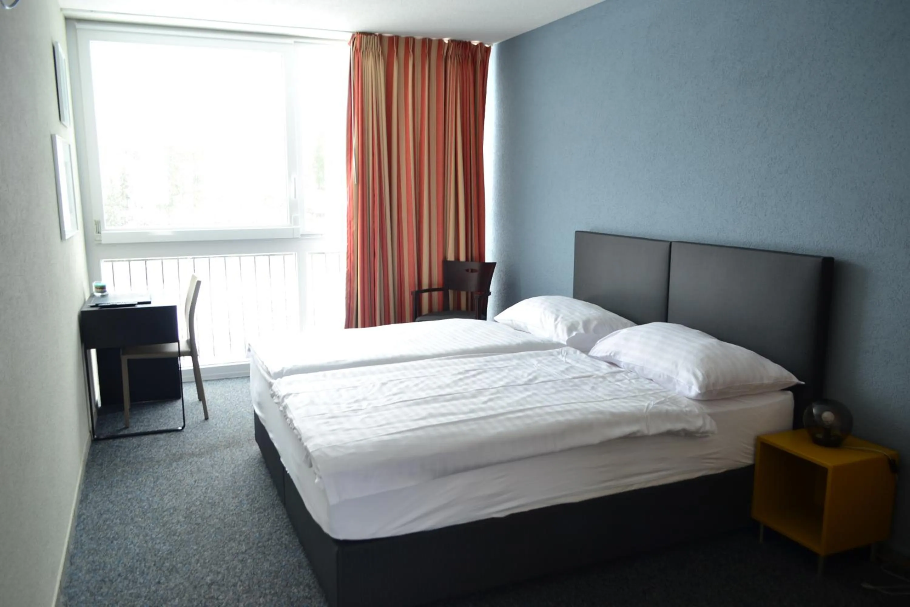 Bed in Hotel Les Rives Du Doubs