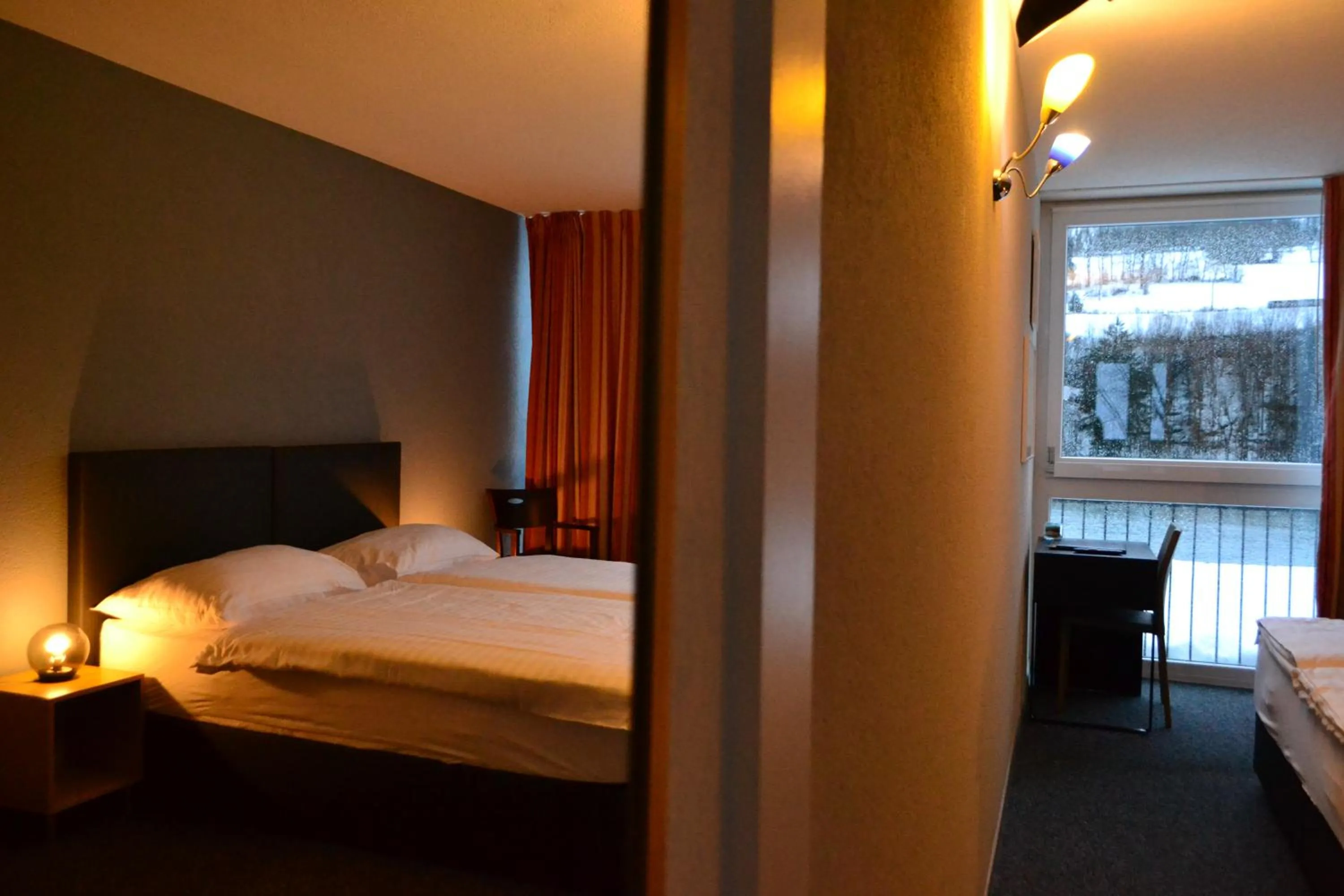 Bed in Hotel Les Rives Du Doubs