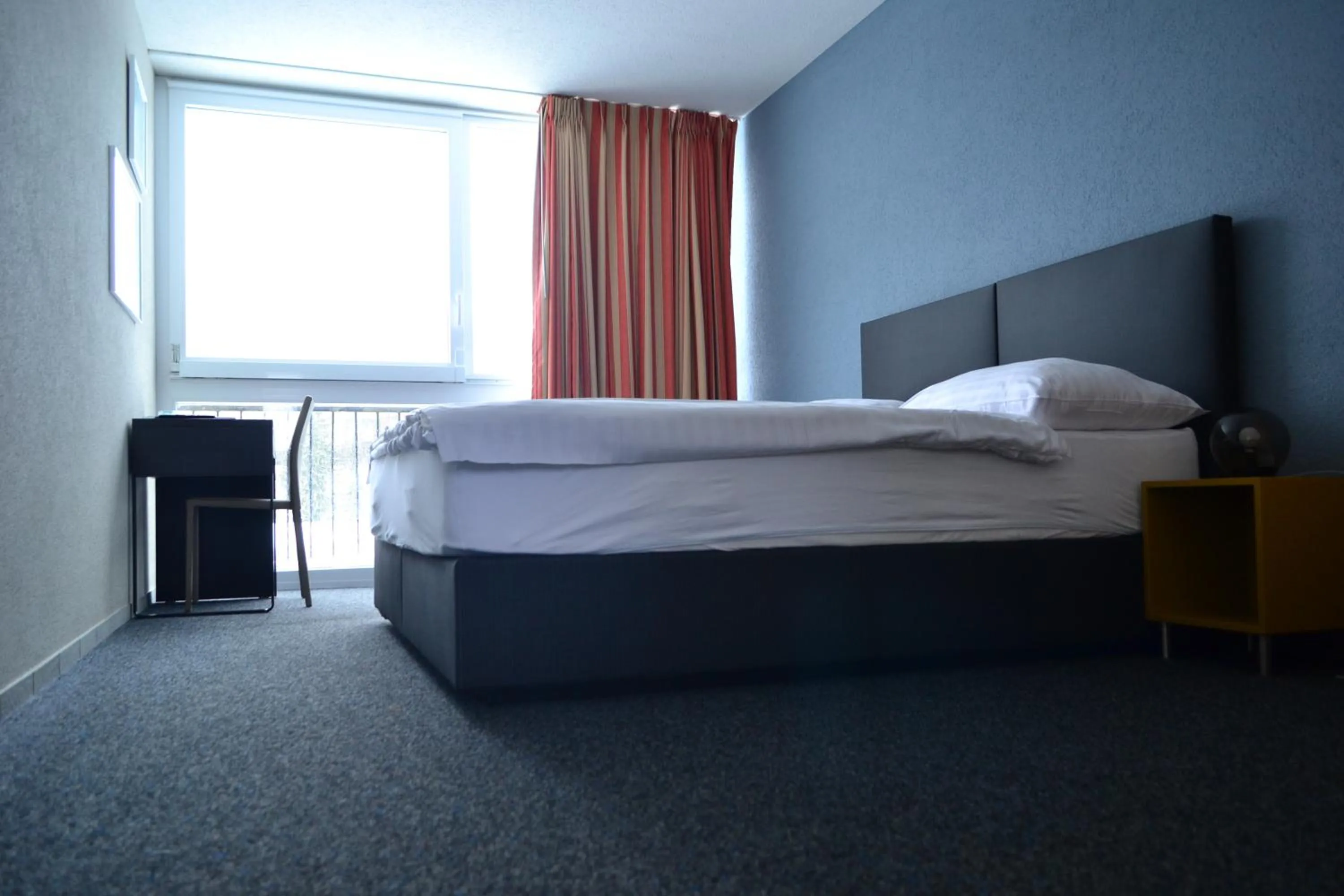 Bed in Hotel Les Rives Du Doubs