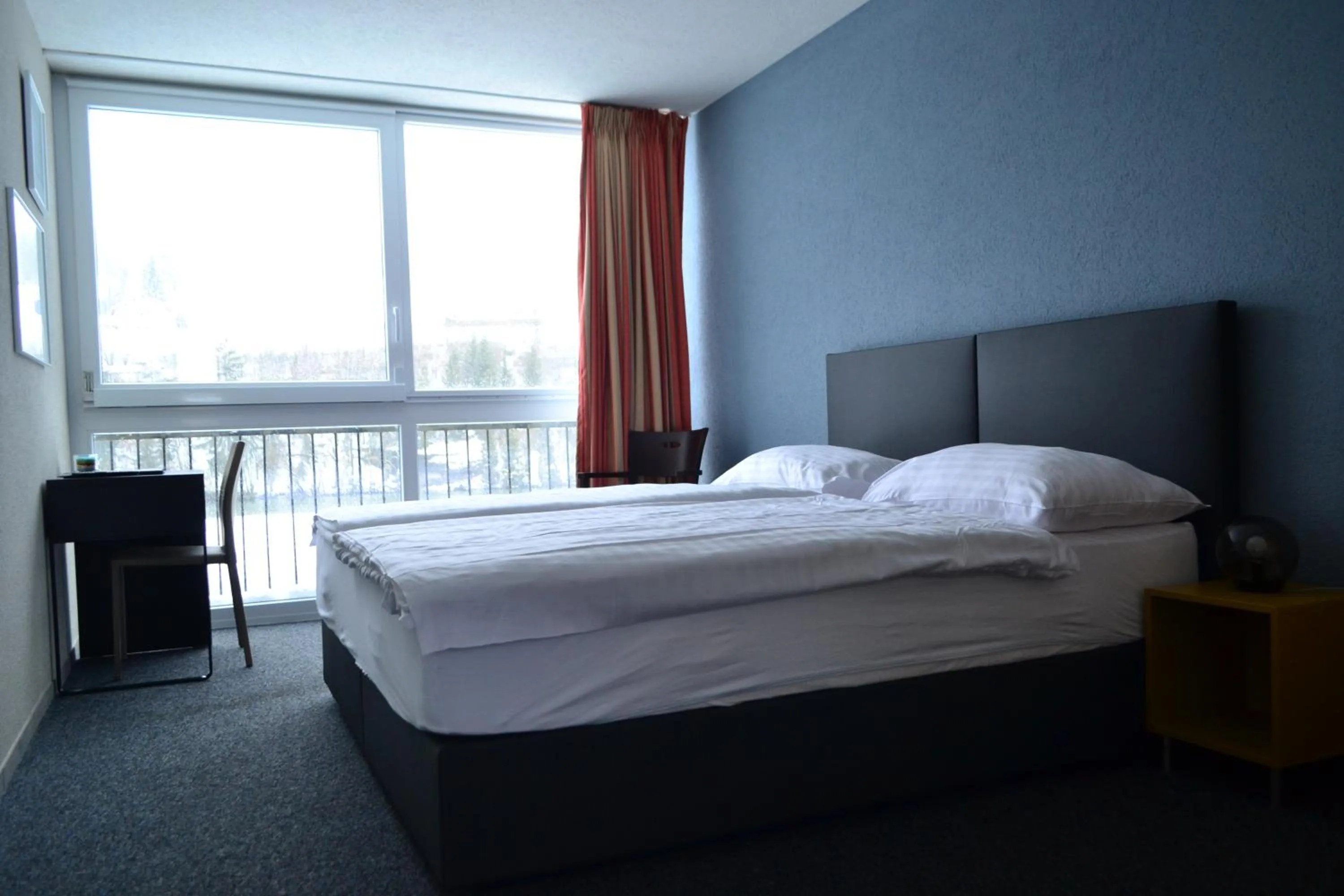 Bed in Hotel Les Rives Du Doubs