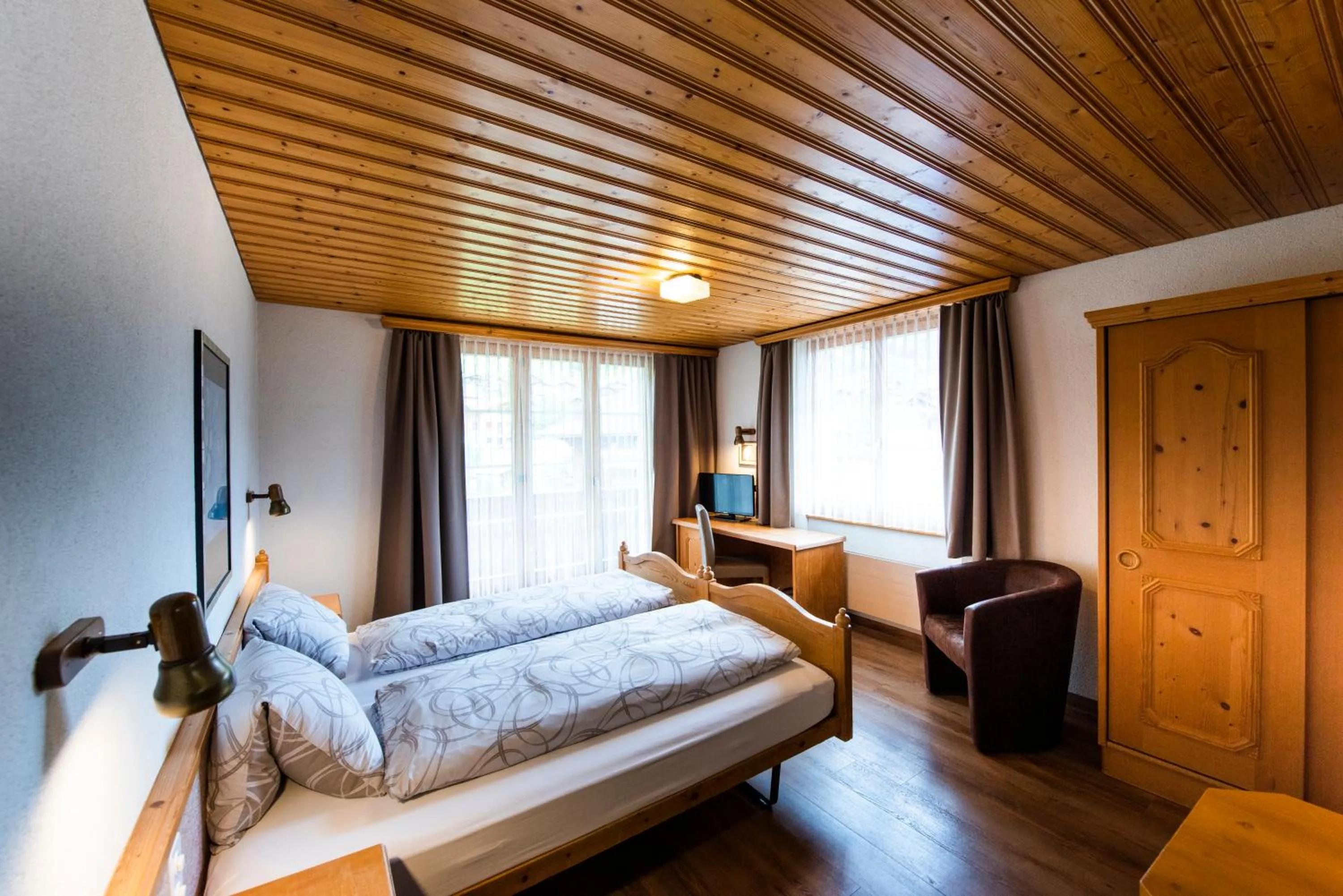 Bed in Hotel Brienzerburli