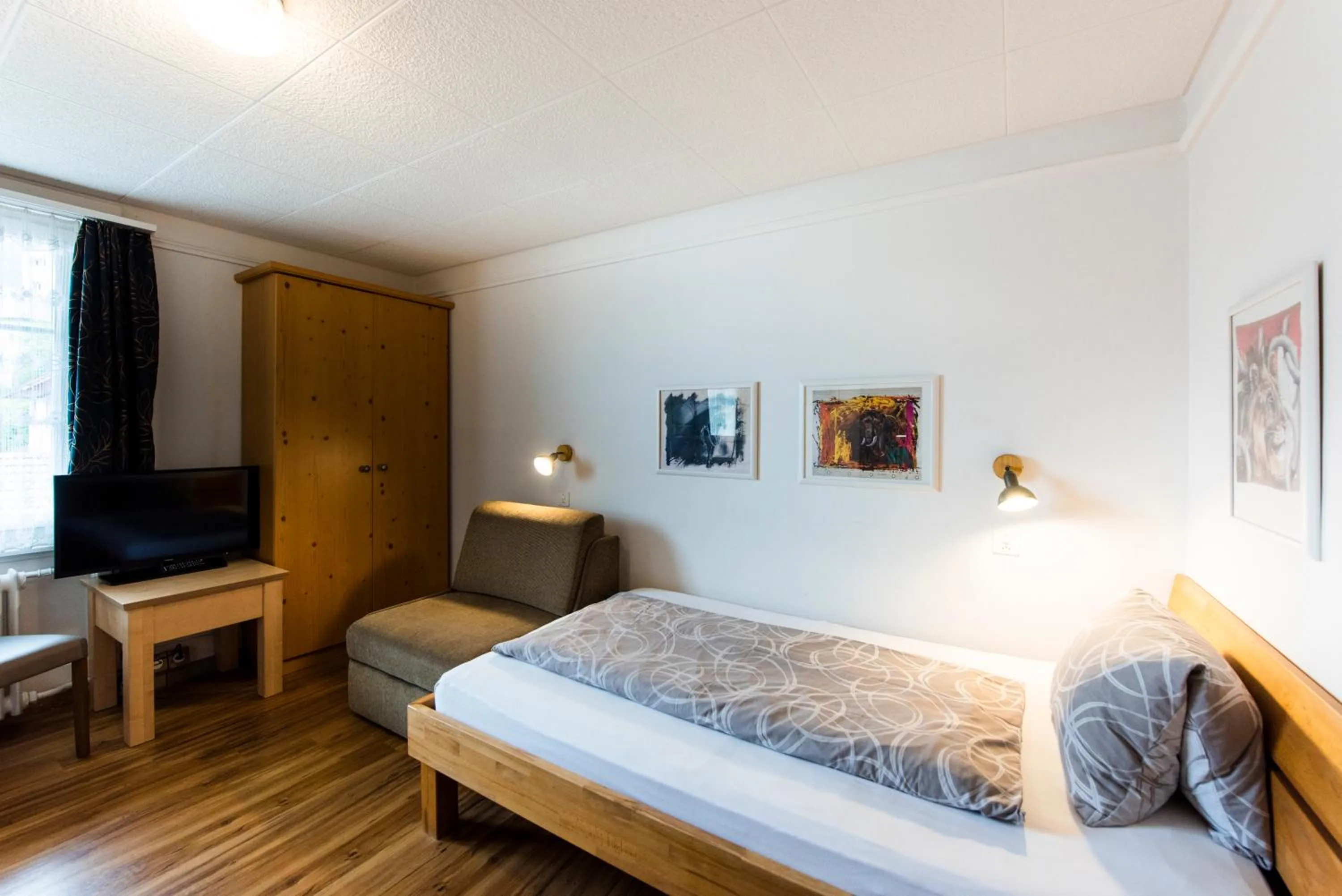 Bed in Hotel Brienzerburli