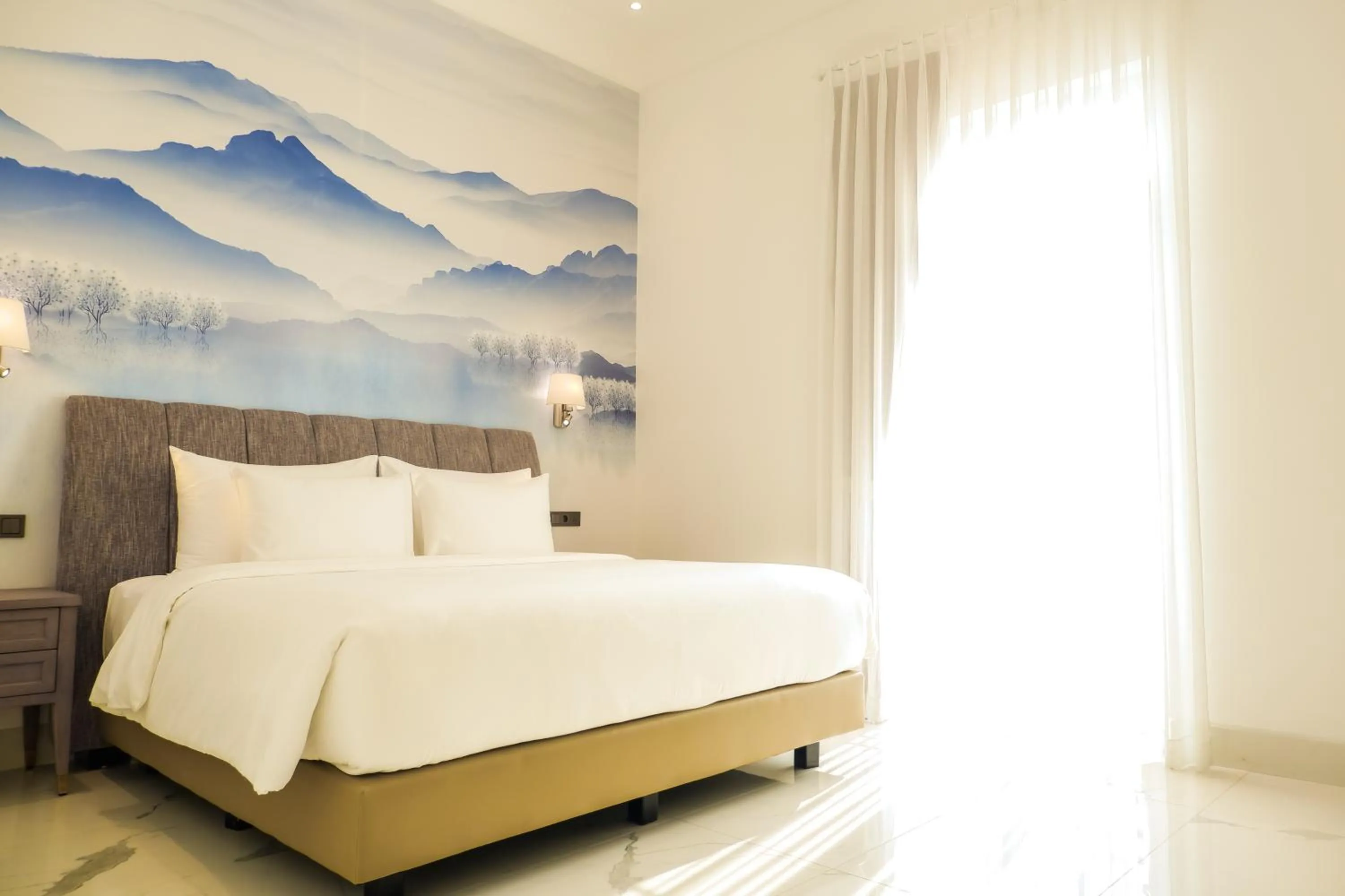 Bed in The Grand Mansion Menteng by The Crest Collection