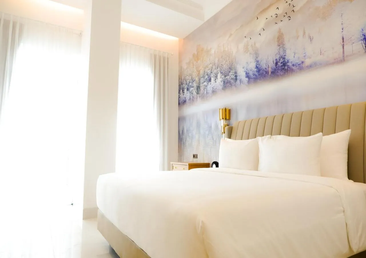 Bed in The Grand Mansion Menteng by The Crest Collection