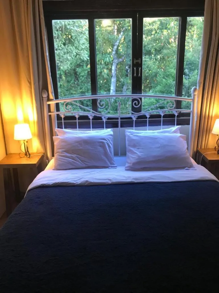 Bed in Pousada VillaSerrana