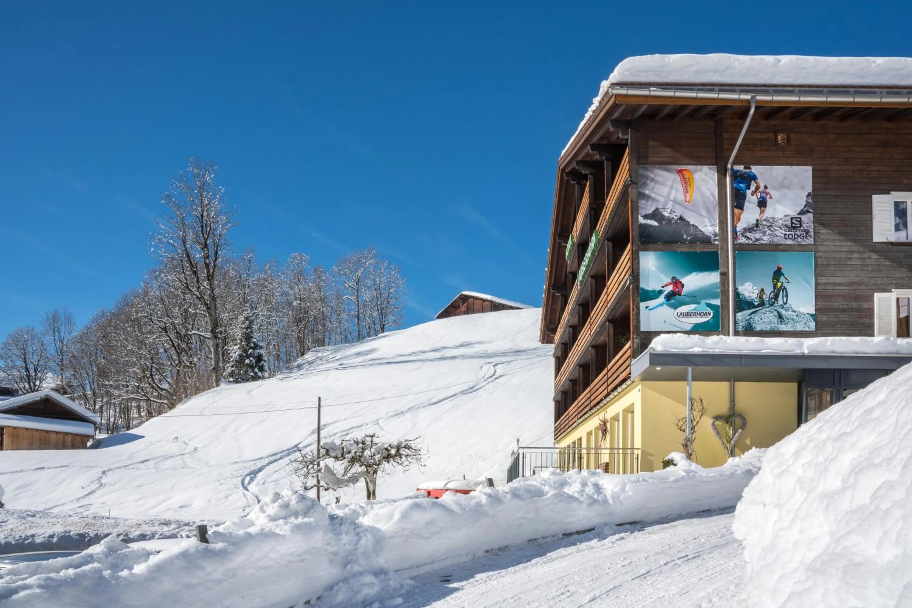 Property building, Winter in Hotel Lauberhorn - Home for Outdoor Activities