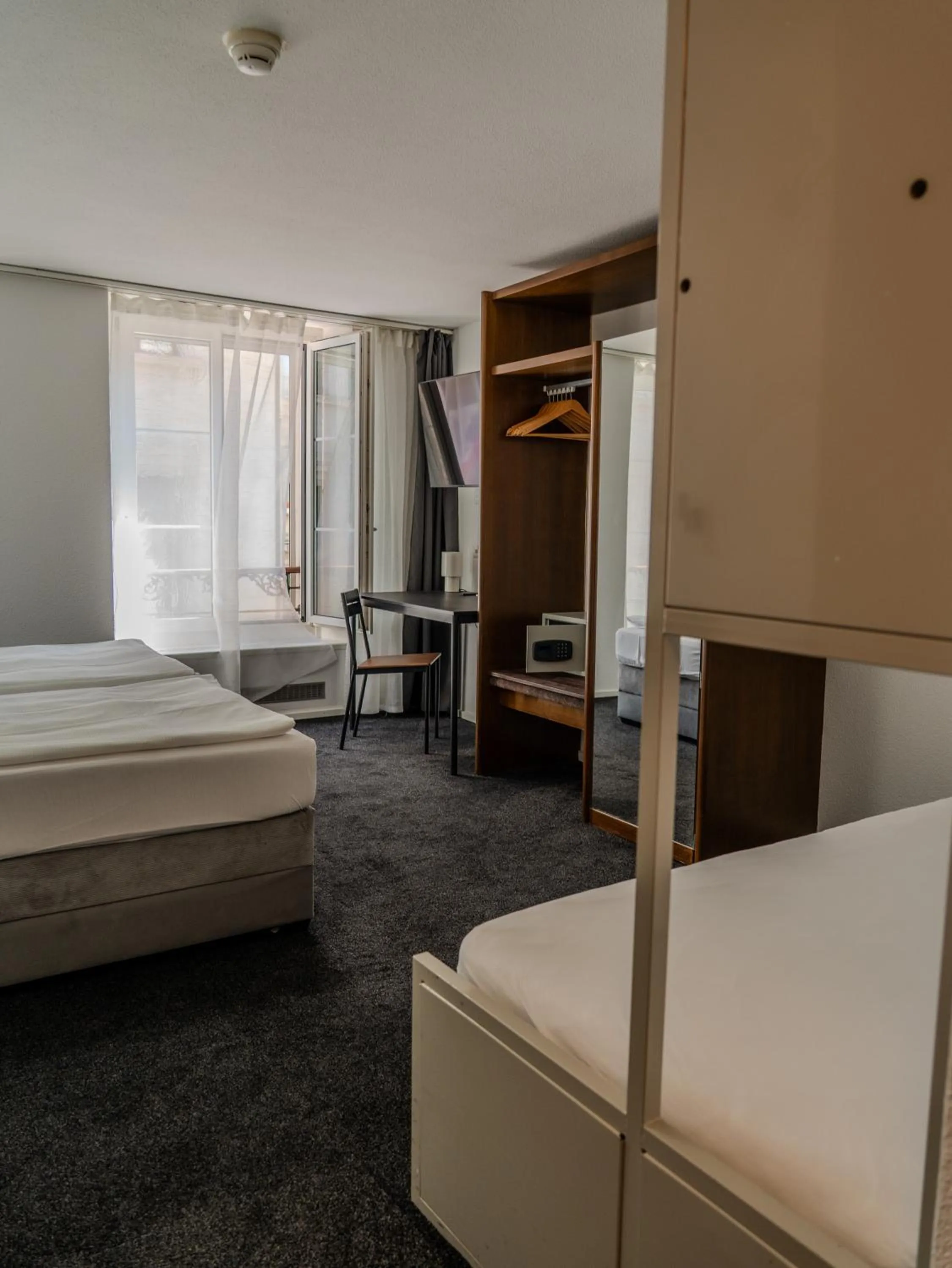 Photo of the whole room, Bed in Hotel Baslertor