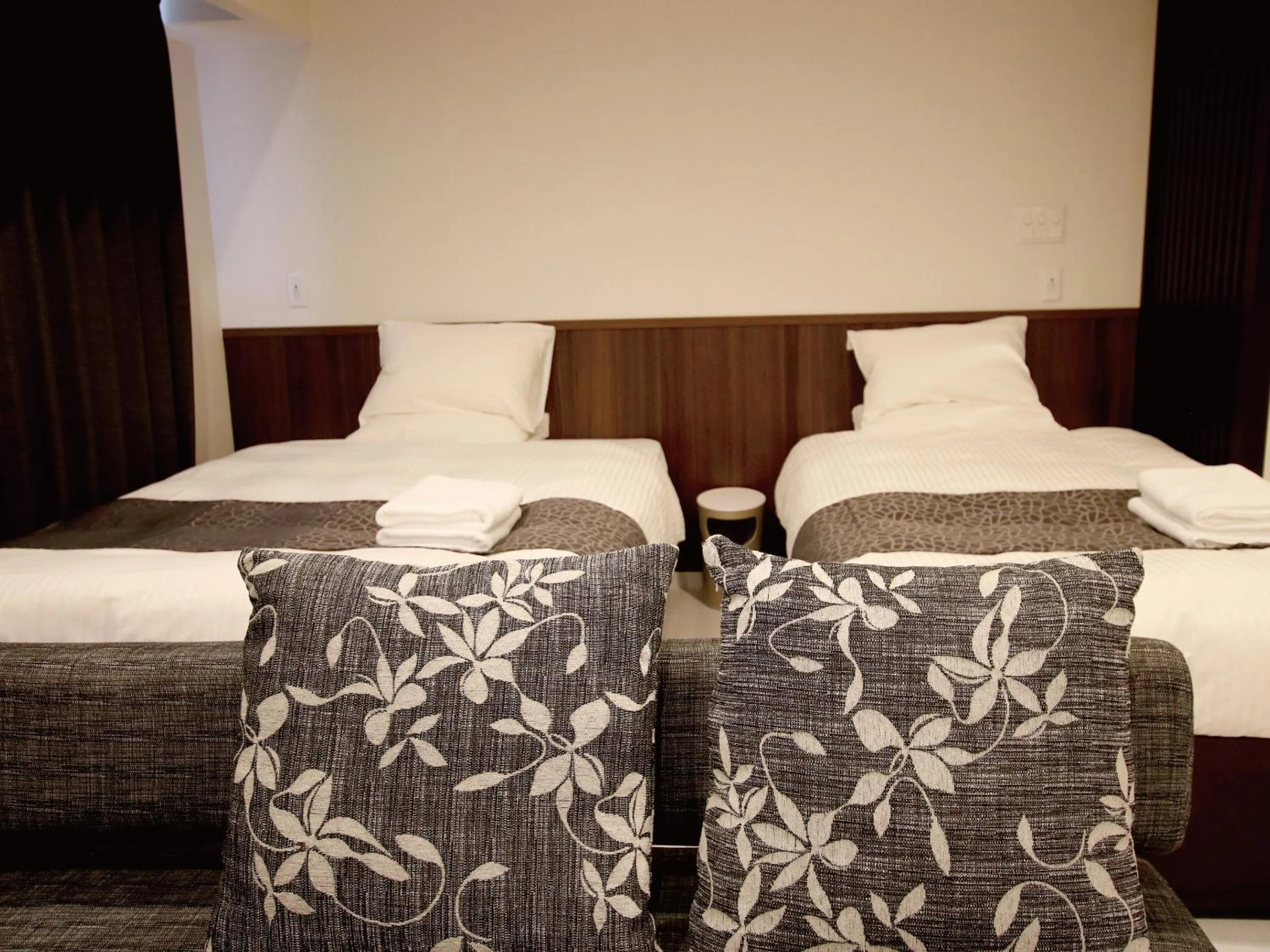 Bed in Sunset Resort Mihama -SEVEN Hotels and Resorts-