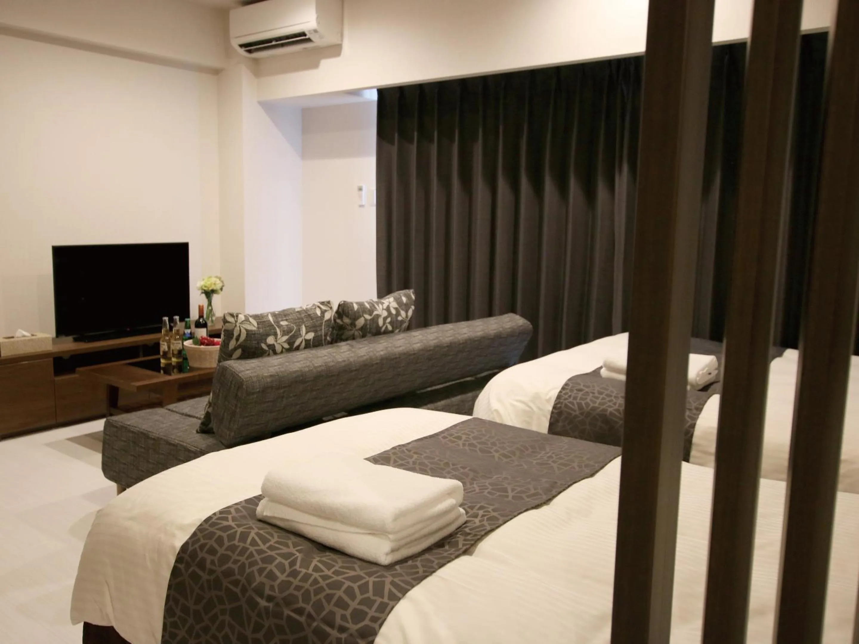 Bed in Sunset Resort Mihama -SEVEN Hotels and Resorts-