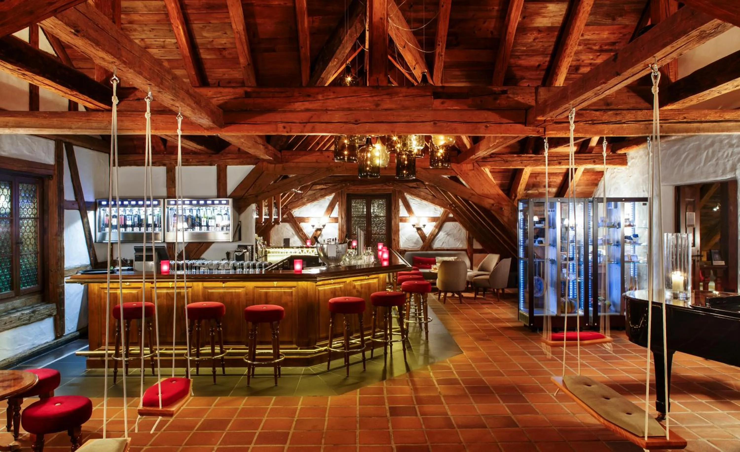 Lounge or bar in Swiss-Chalet Merlischachen - Historik Chalet-Hotel Lodge
