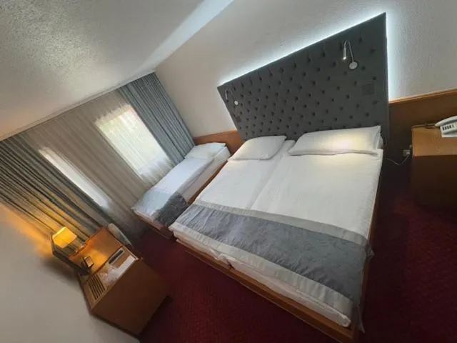 Bed in Hôtel des Trois Rois