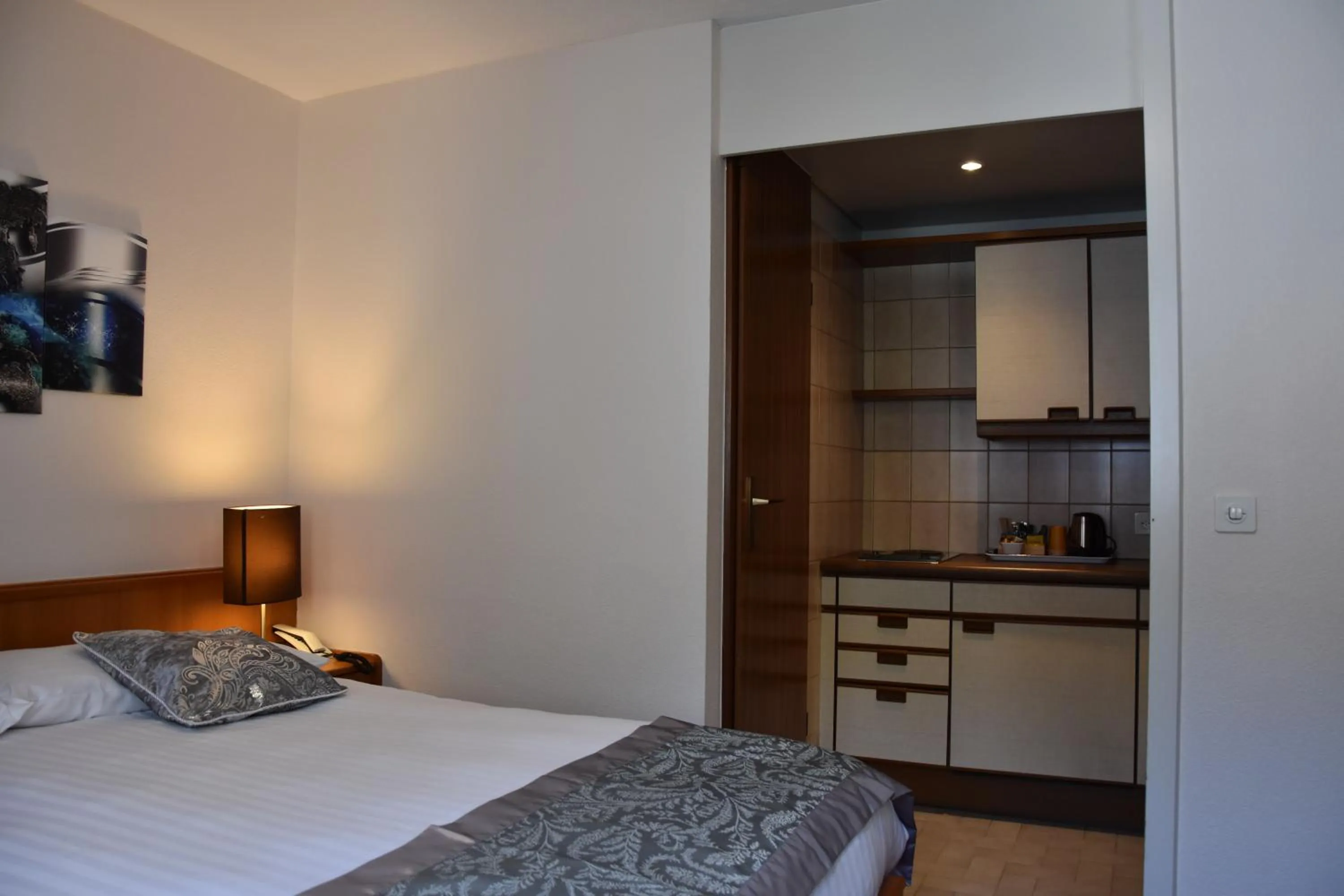 Bed in Hôtel des Trois Rois