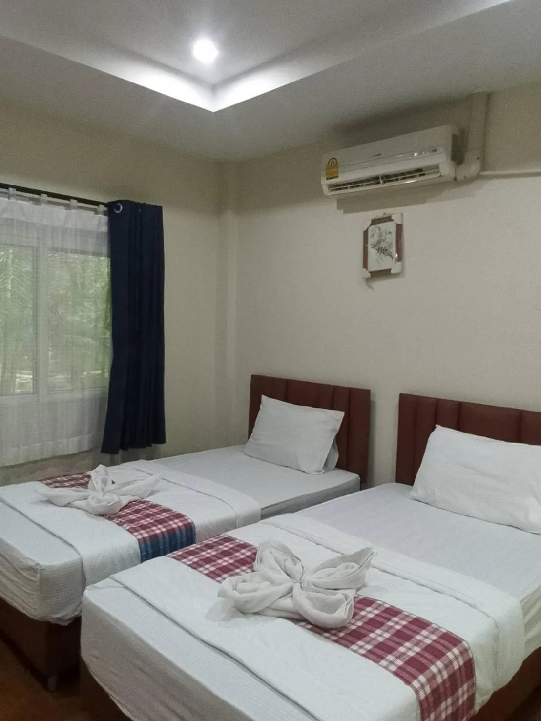 Bed in Sripiamsuk Resort Bangkok