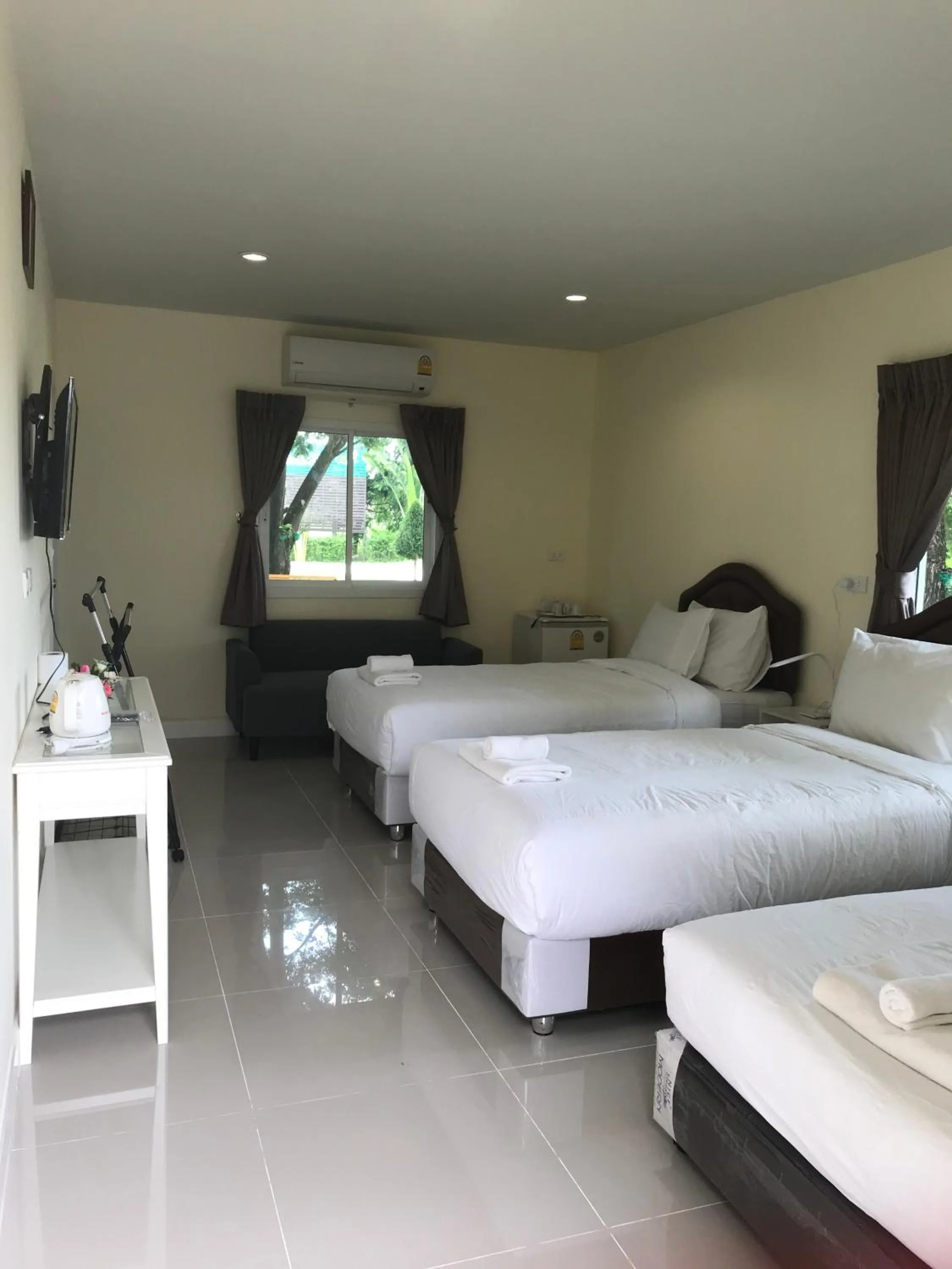 Bed in Sripiamsuk Resort Bangkok