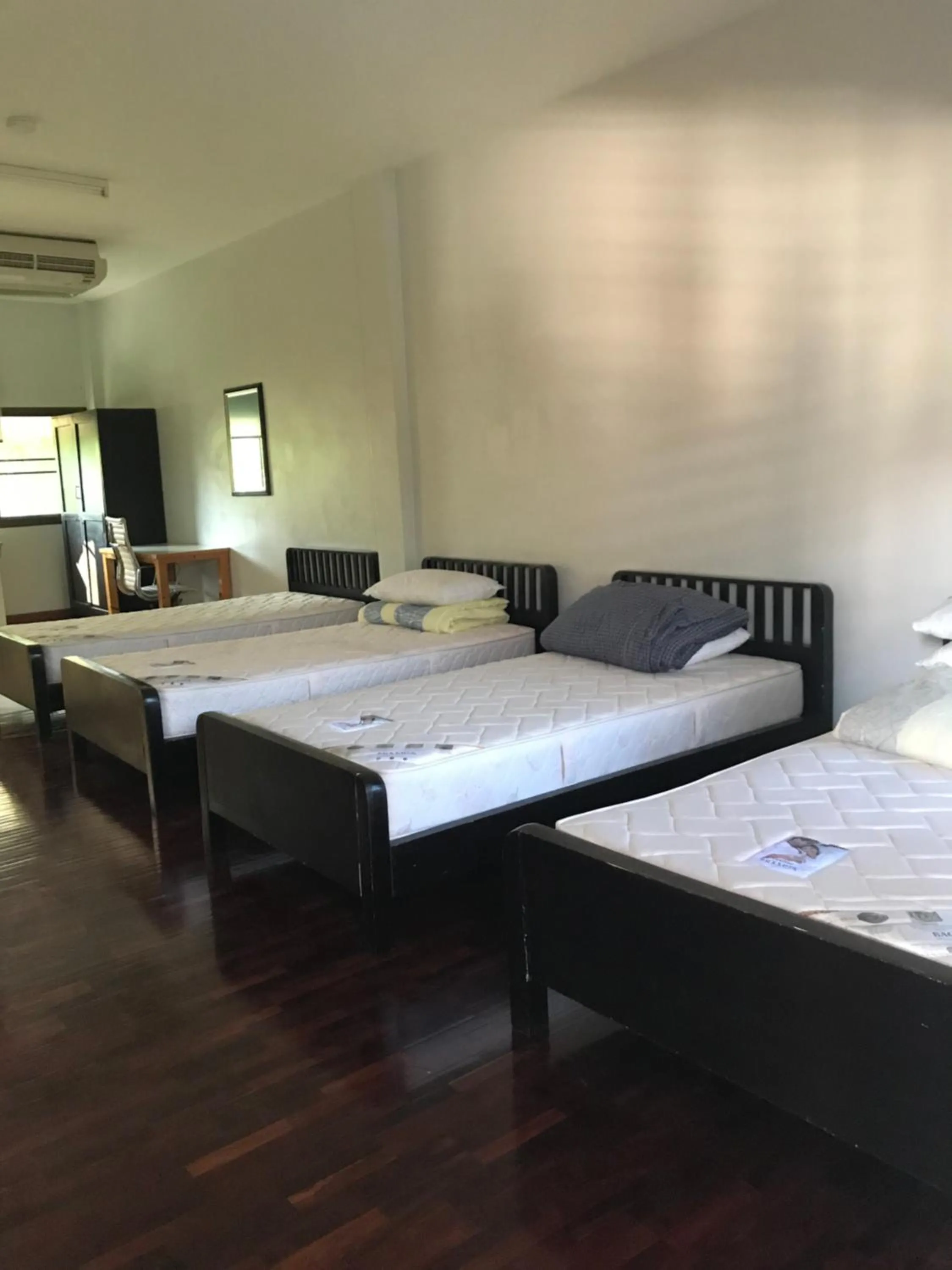 Bed in Sripiamsuk Resort Bangkok
