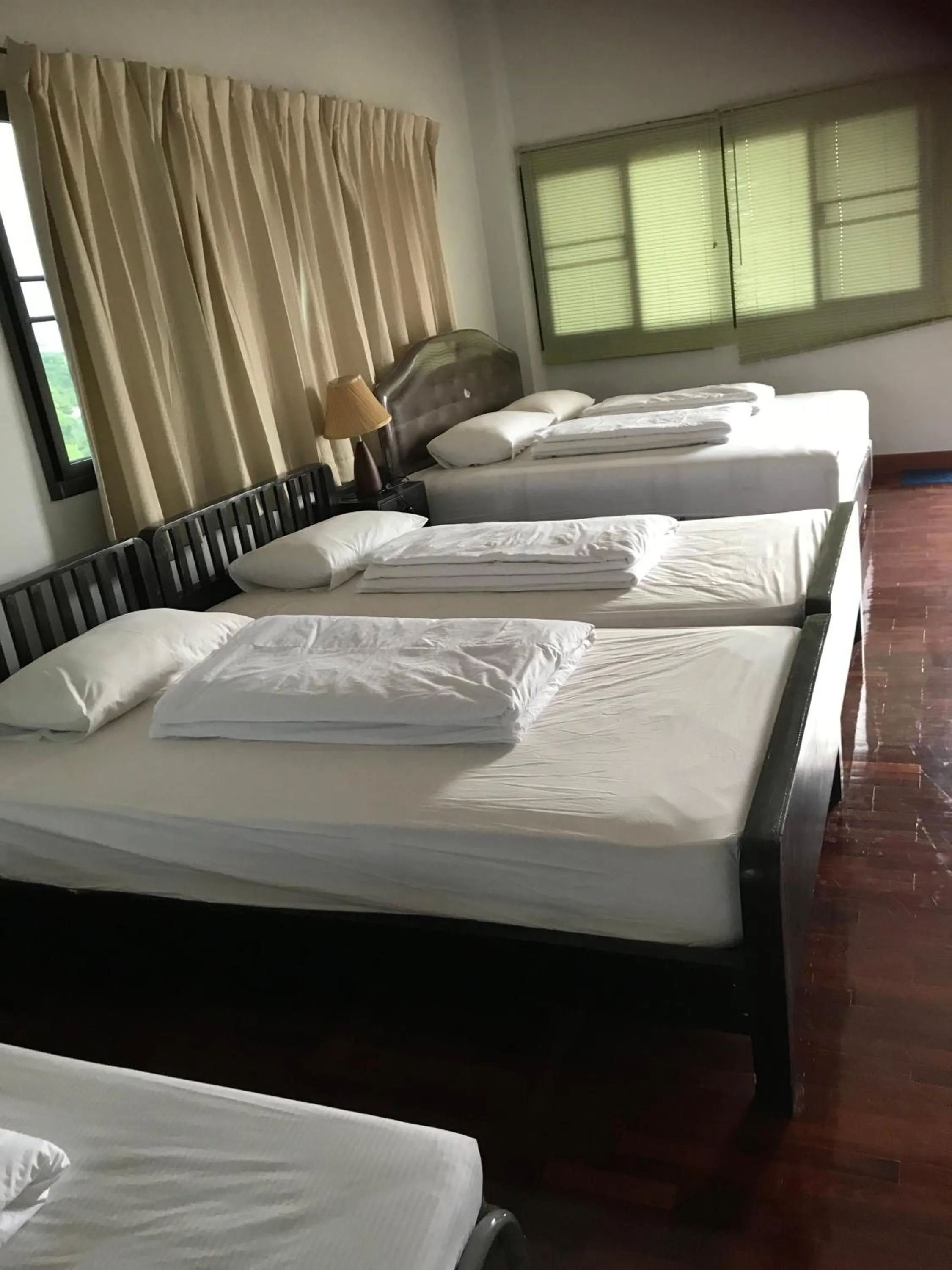 Bed in Sripiamsuk Resort Bangkok