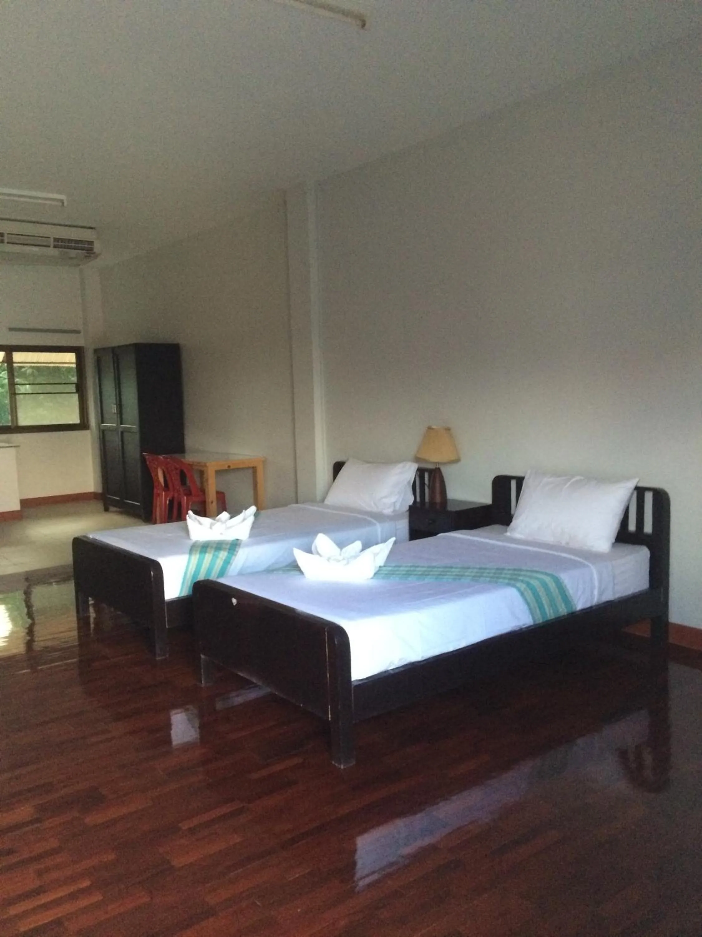 Bed in Sripiamsuk Resort Bangkok
