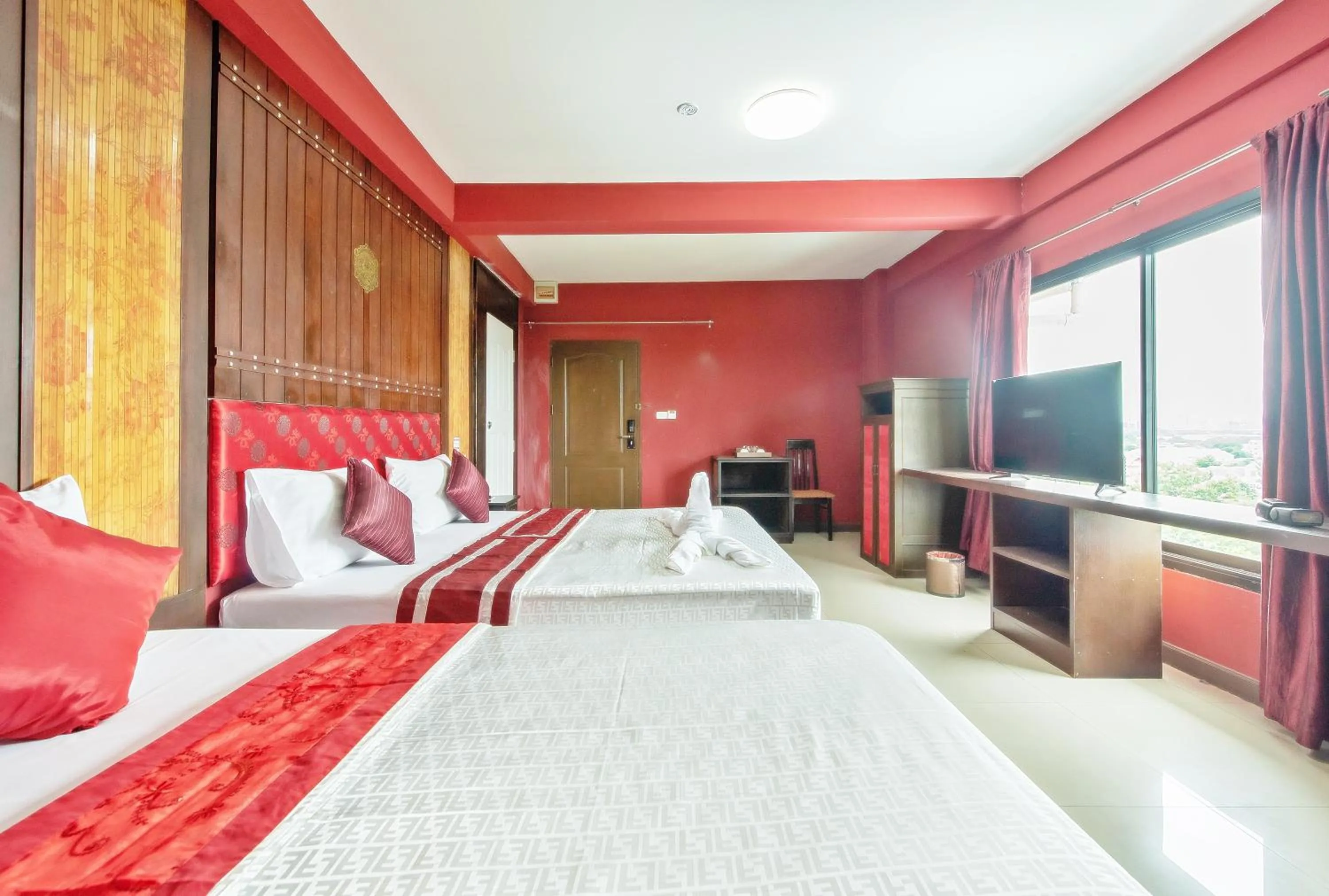 Bed in The Wing Design Hotel