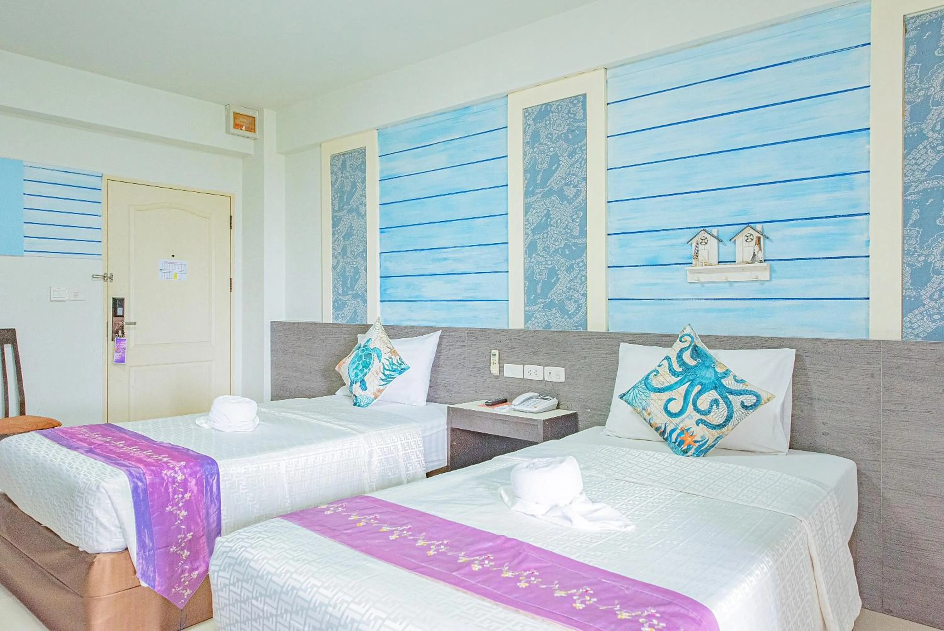 Bed in The Wing Design Hotel